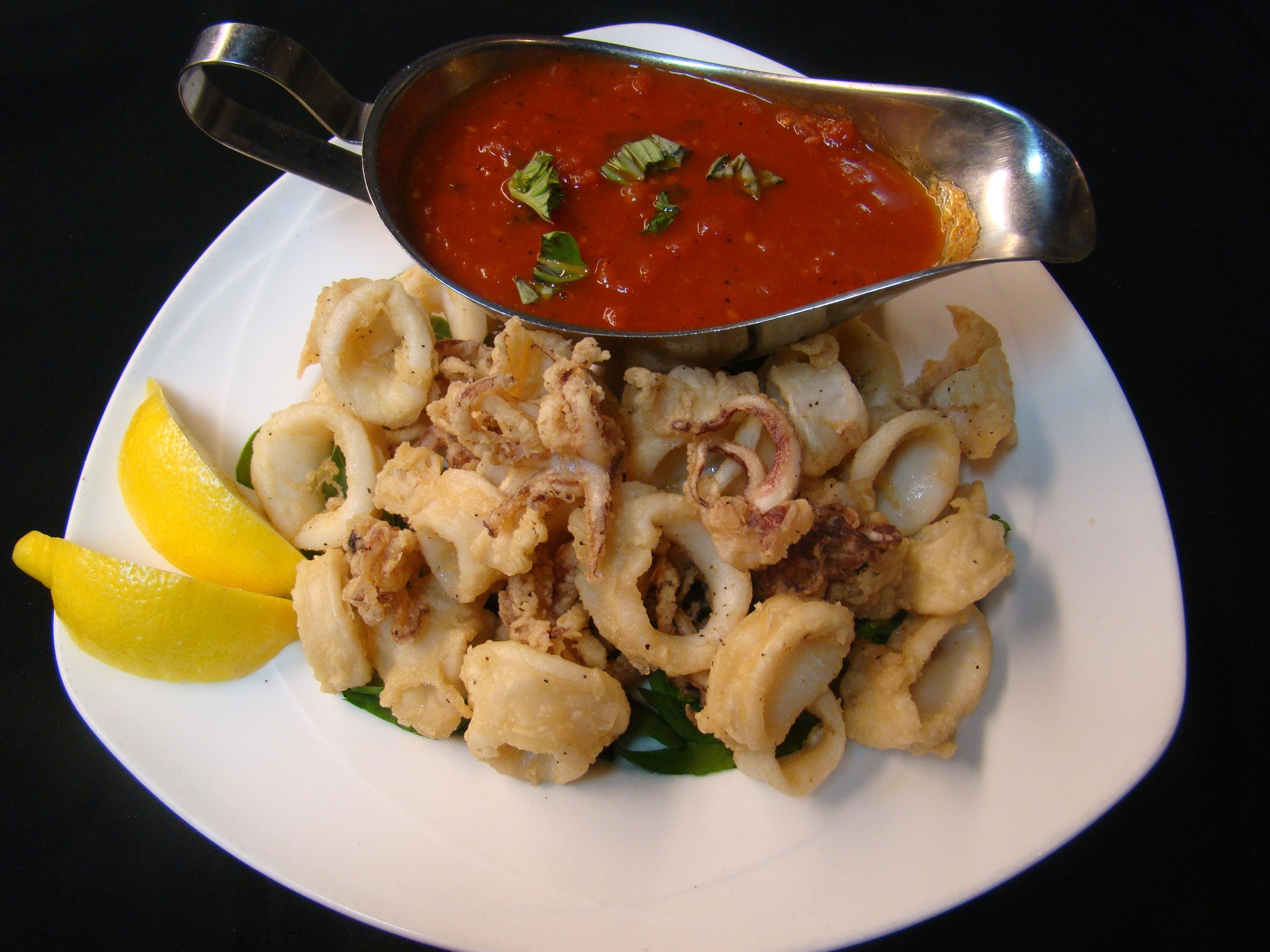 Order Fried Calamari - Appetizer food online from Rocco Pizzeria store, New Paltz on bringmethat.com