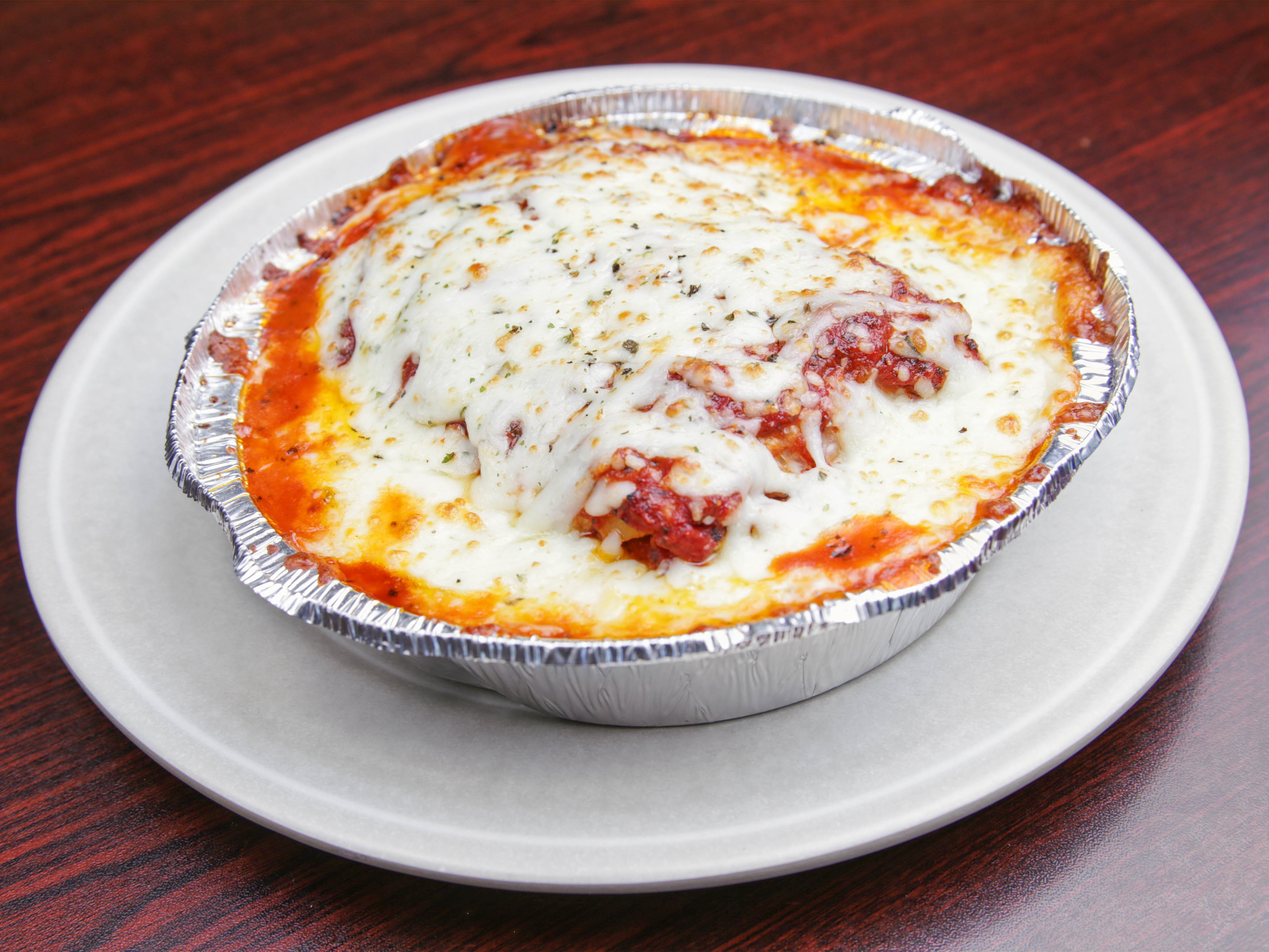 Order Meat Lasagna food online from Rino D's Pizza & Wings store, Gilbert on bringmethat.com