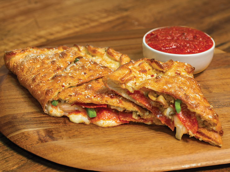 Order Deluxe Calzone food online from Marco Pizza store, Denton on bringmethat.com