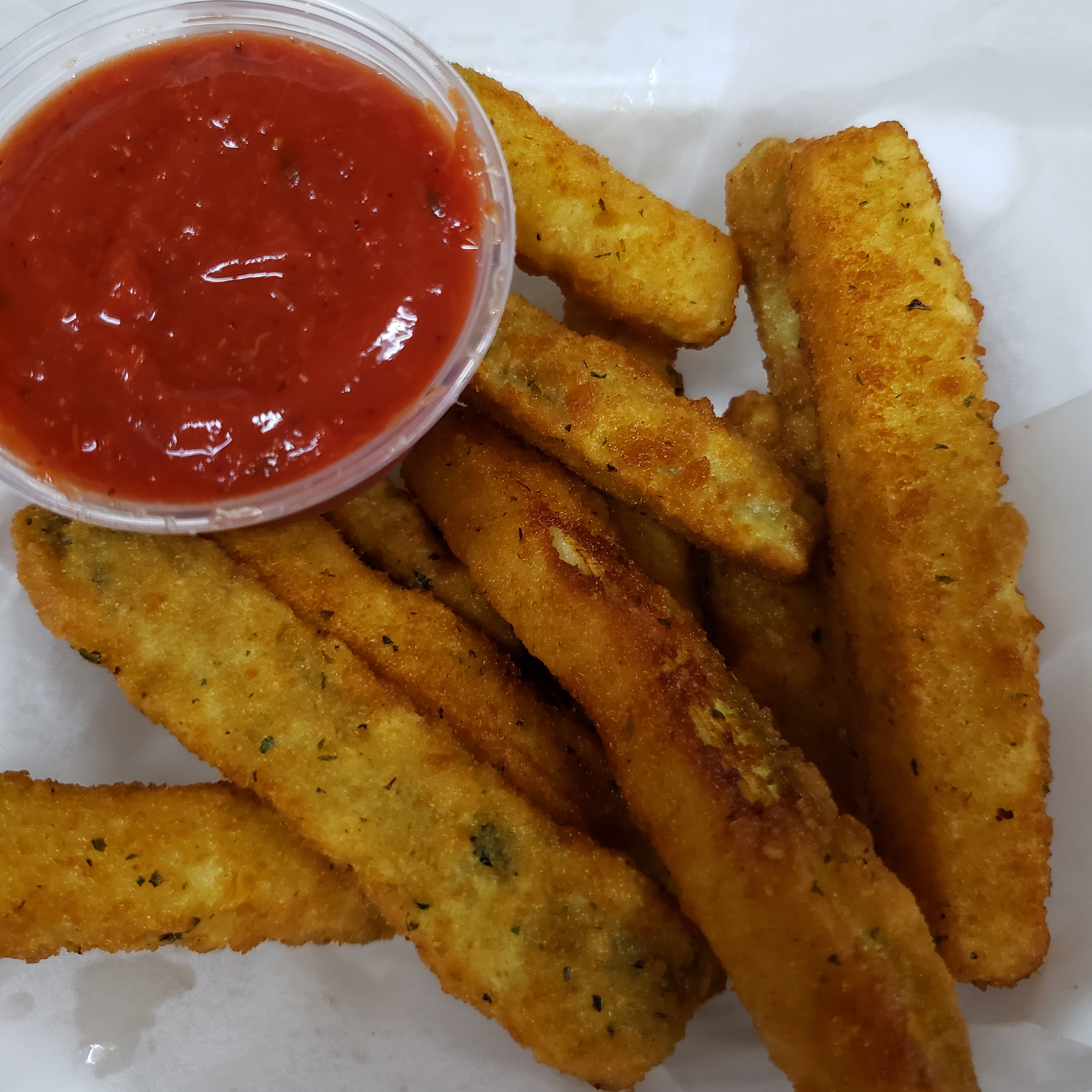 Order Fried Zucchini 12 food online from Pizza Mart store, Baltimore on bringmethat.com