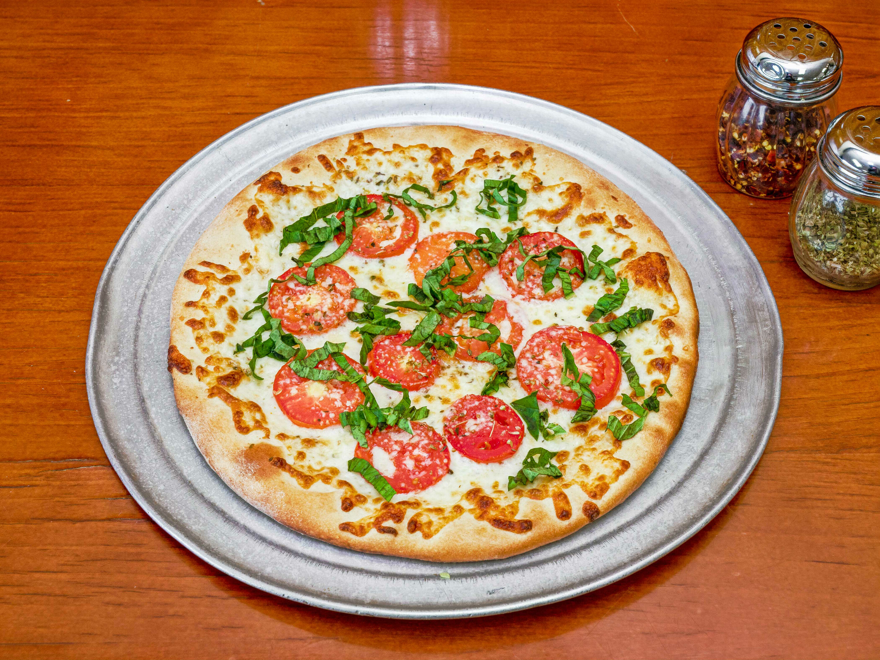 Order BV Tomatoes White Pizza food online from Bella Villa store, West Haven on bringmethat.com