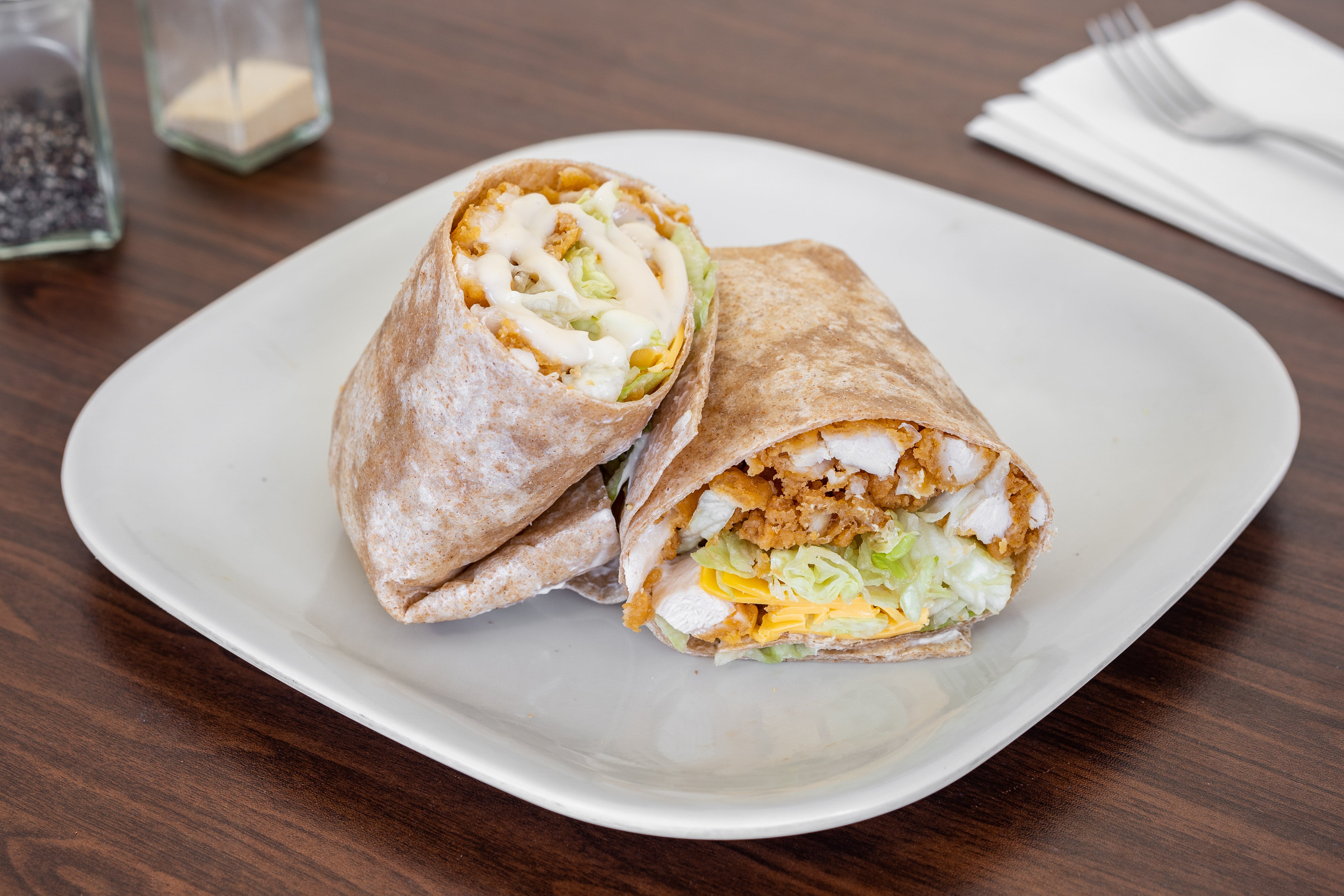 Order Grilled Chicken Caesar Wrap - Wraps food online from Stella Pizzeria store, Perth Amboy on bringmethat.com
