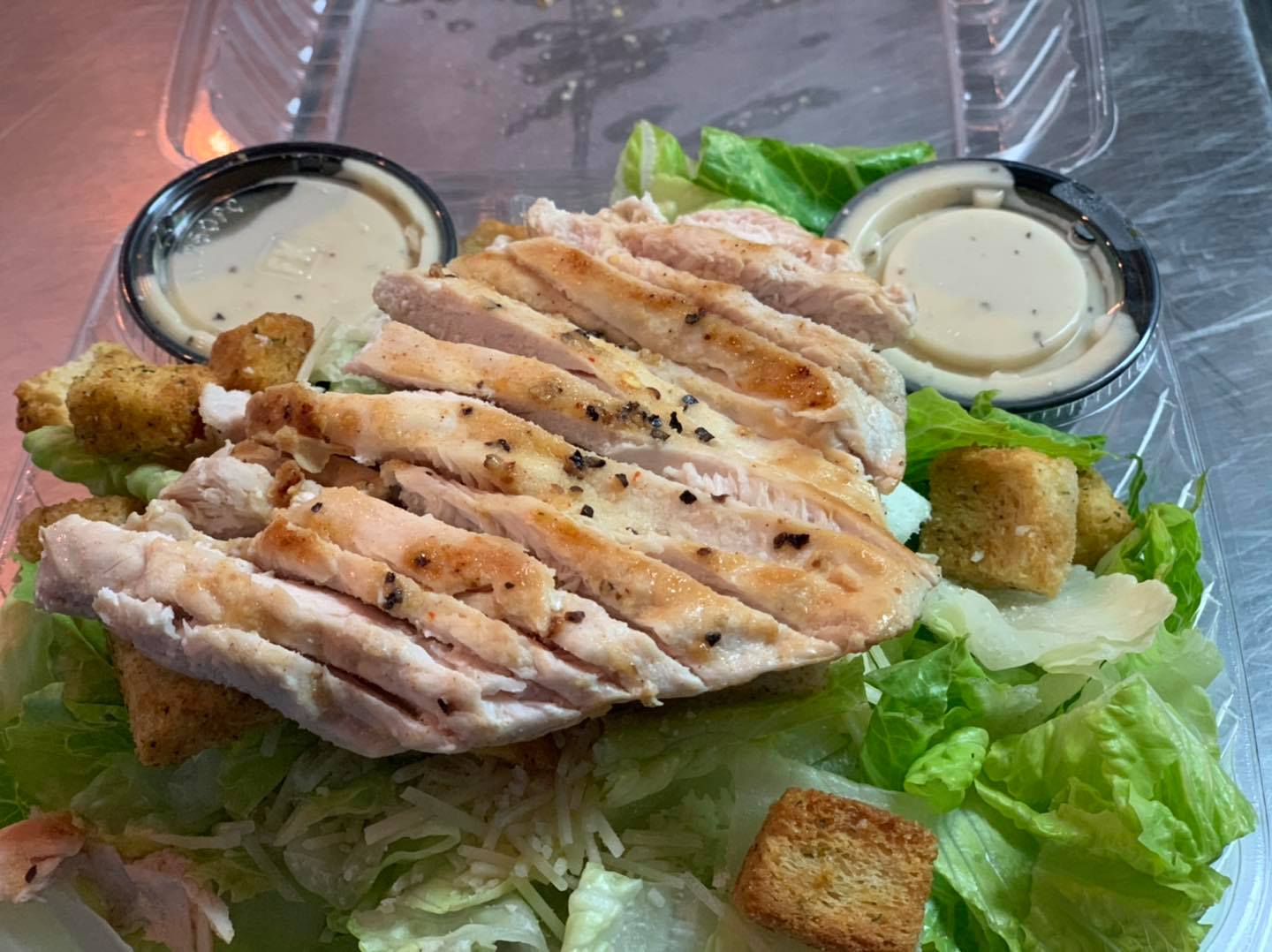 Order Caesar Salad food online from Booyah Burgers store, Wyoming on bringmethat.com