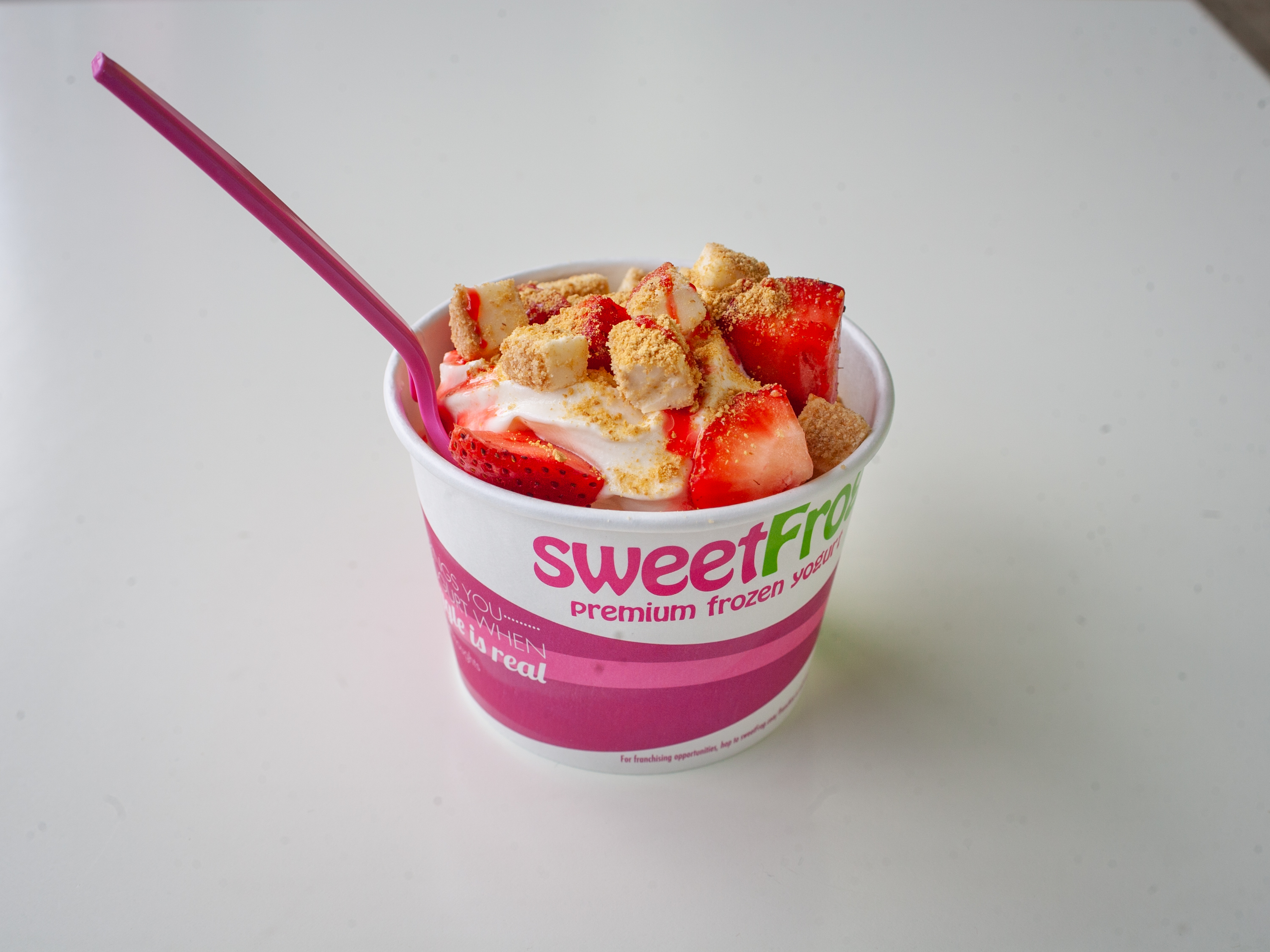 Order Medium Yogurt Cup with 3 Toppings food online from Sweet Frog store, Binghamton on bringmethat.com