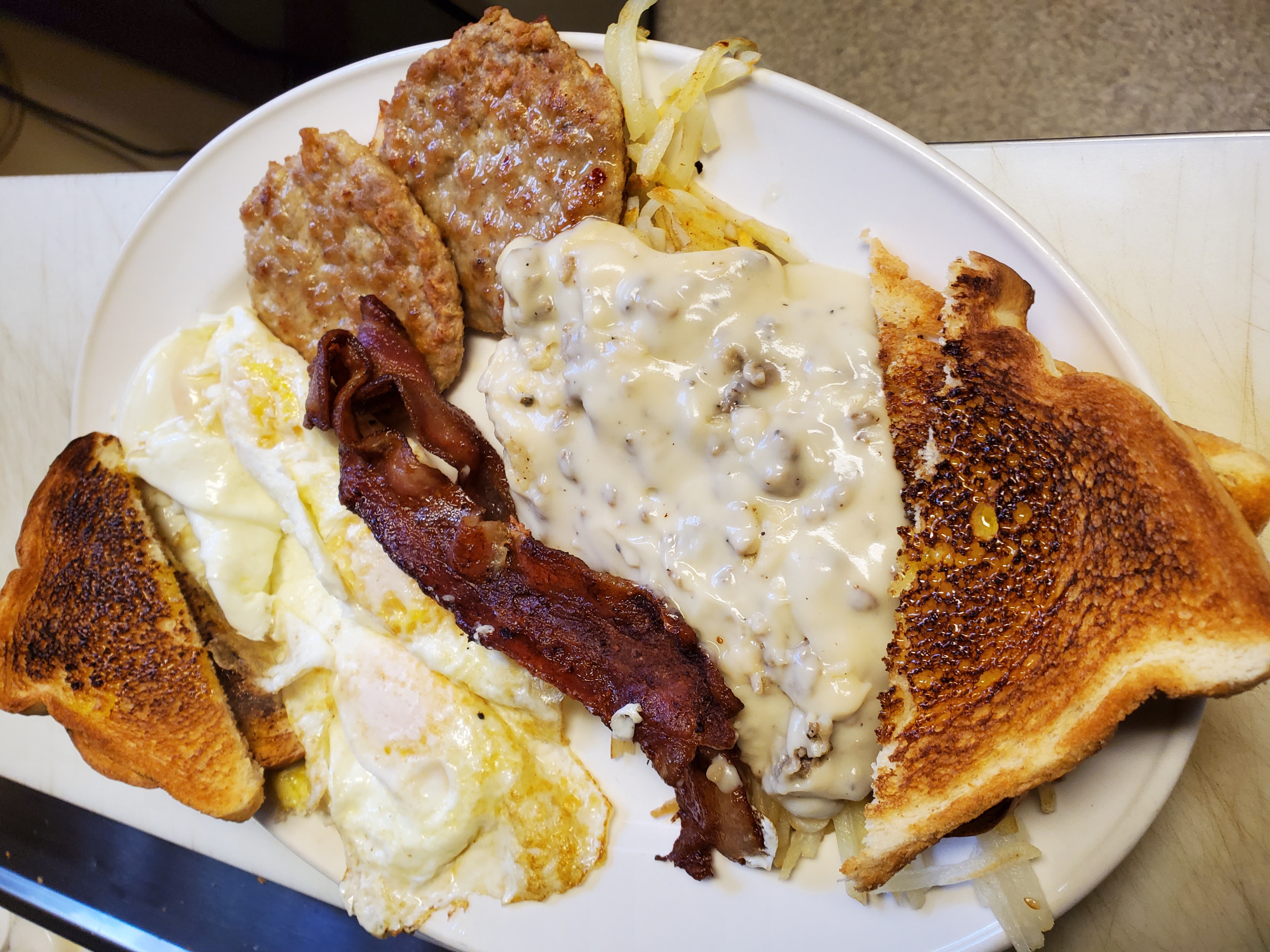 Order Hungry Man's Breakfast food online from Roadhouse Saloon store, Idaho Falls on bringmethat.com