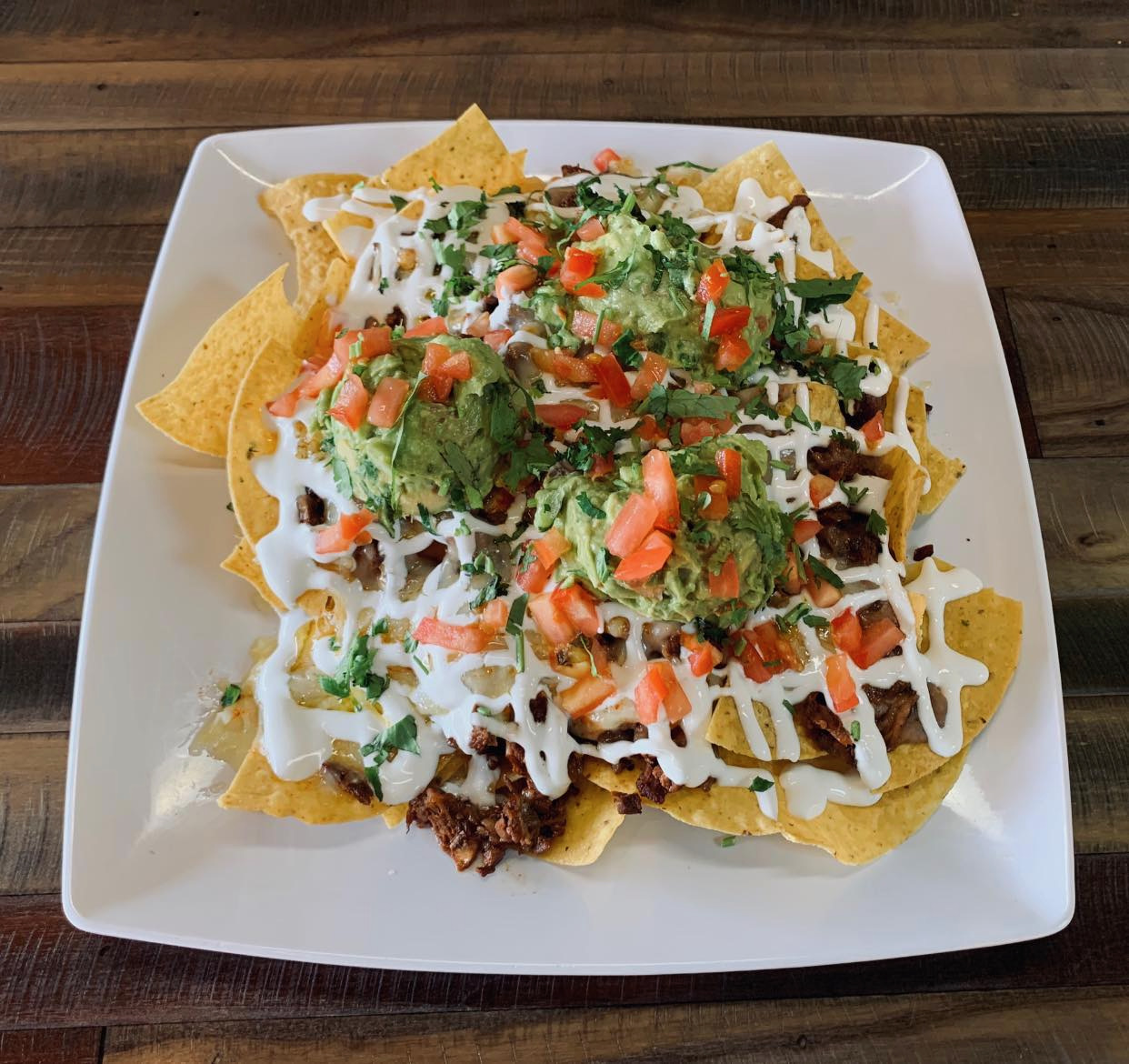 Order Nachos with Meat food online from Ixcateco Grill store, Chicago on bringmethat.com