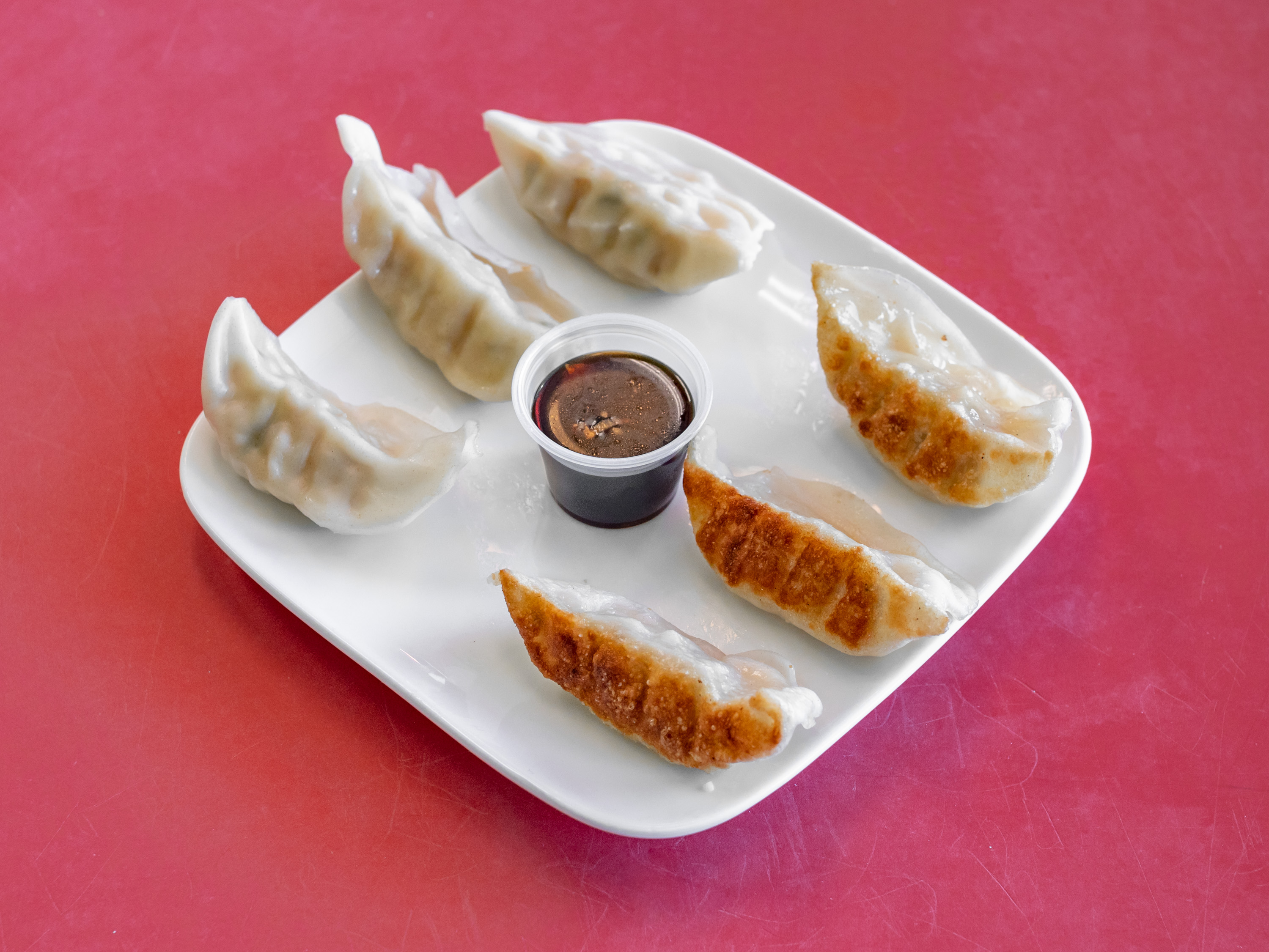 Order Pan Fried Chicken Dumplings food online from Eat First #1 store, Chicago on bringmethat.com