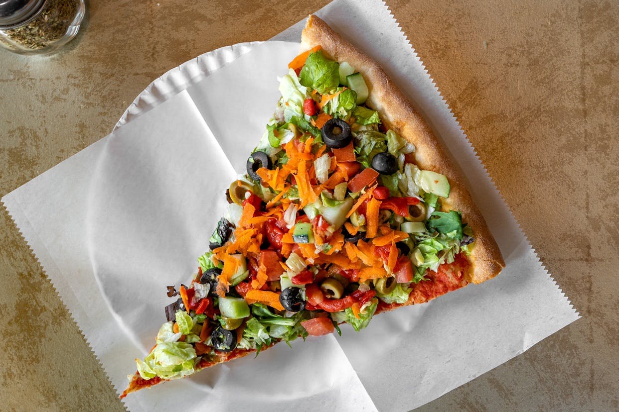 Order Salad Pizza* - Salad Pizza* food online from La Familia store, Katonah on bringmethat.com