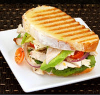 Order Turkey Classic Choice Panini food online from Bagels & Deli Express store, White Plains on bringmethat.com