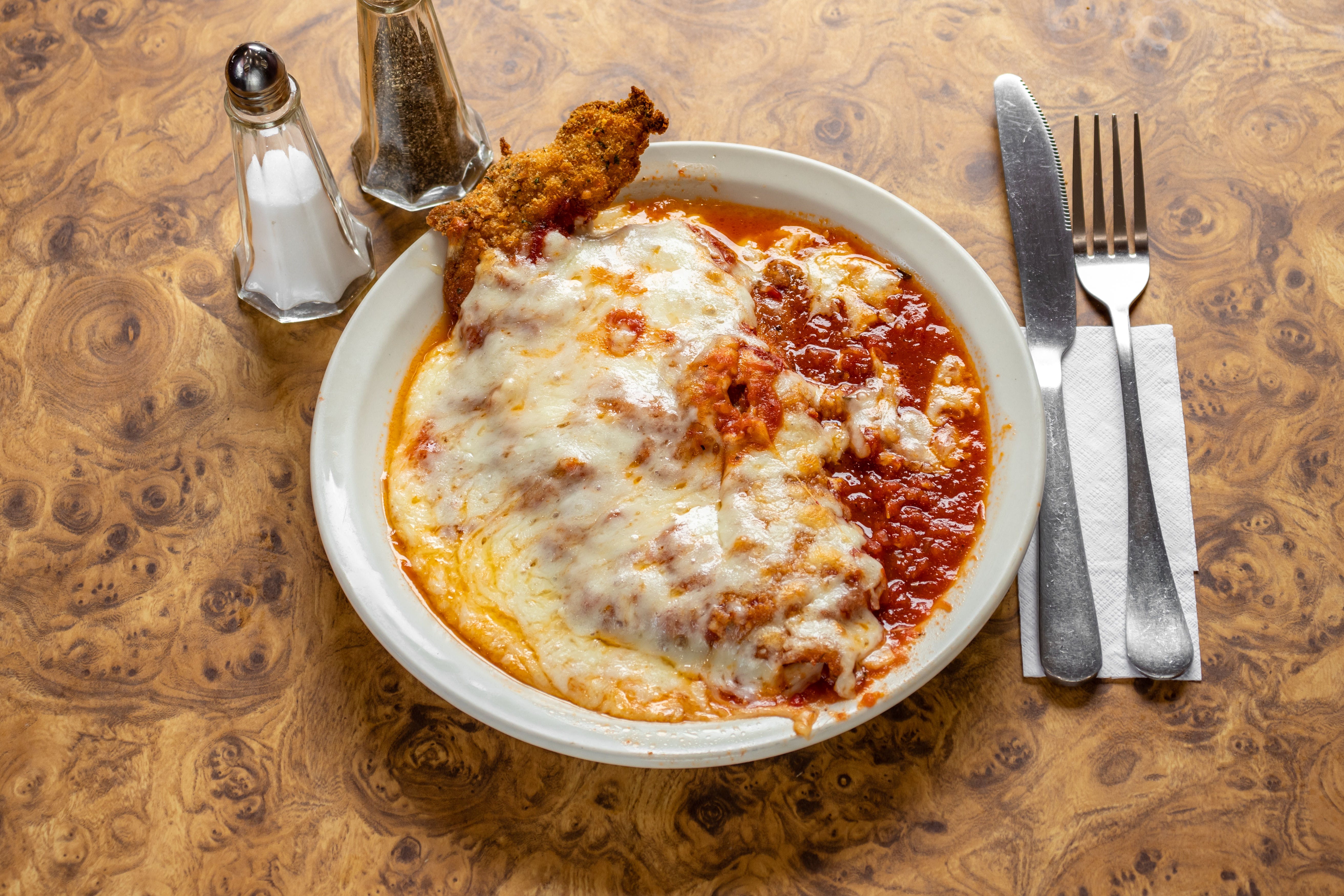 Order Chicken Cutlet Parmigiana - Entree food online from Primos Pizza store, New Windsor on bringmethat.com