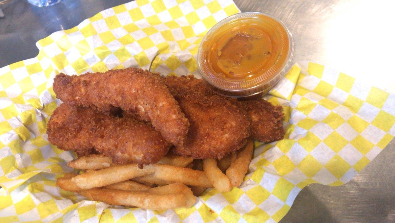 Order 4 Piece Chicken Finger with Fries Basket food online from Muncheez store, Miami Beach on bringmethat.com
