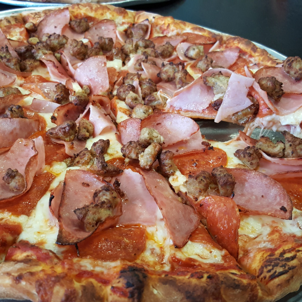 Order Meat Lovers Pizza food online from Deli News Pizza store, Long Beach on bringmethat.com