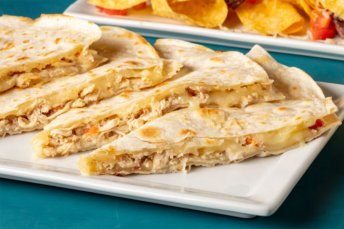 Order Monterey Jack Quesadilla food online from Miguel's Jr store, Norco on bringmethat.com