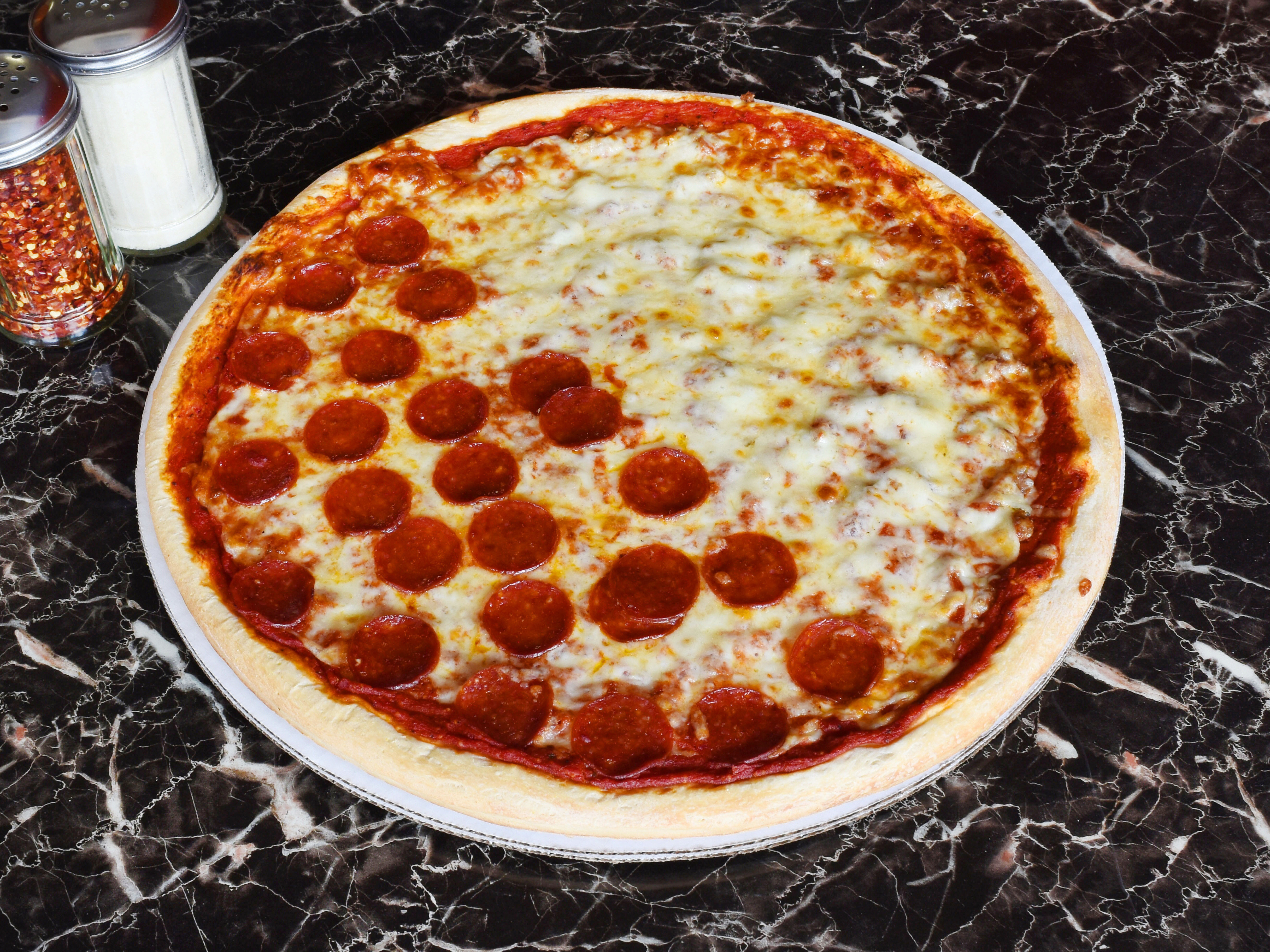Order Sausage Pizza food online from Chely's Pizza store, Cicero on bringmethat.com
