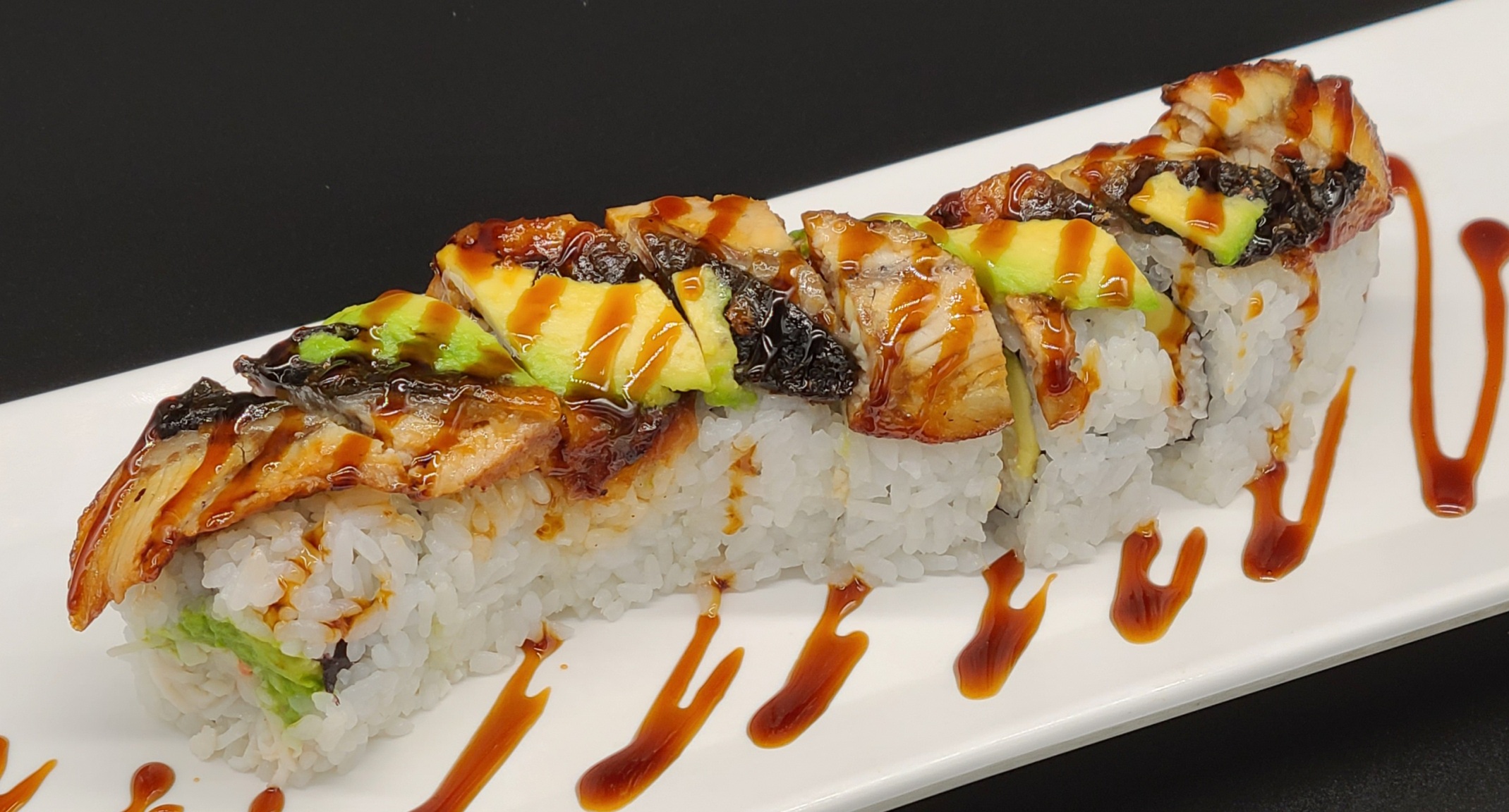 Order F9. Dragon Roll(8pcs) food online from Hello Sushi store, Fullerton on bringmethat.com