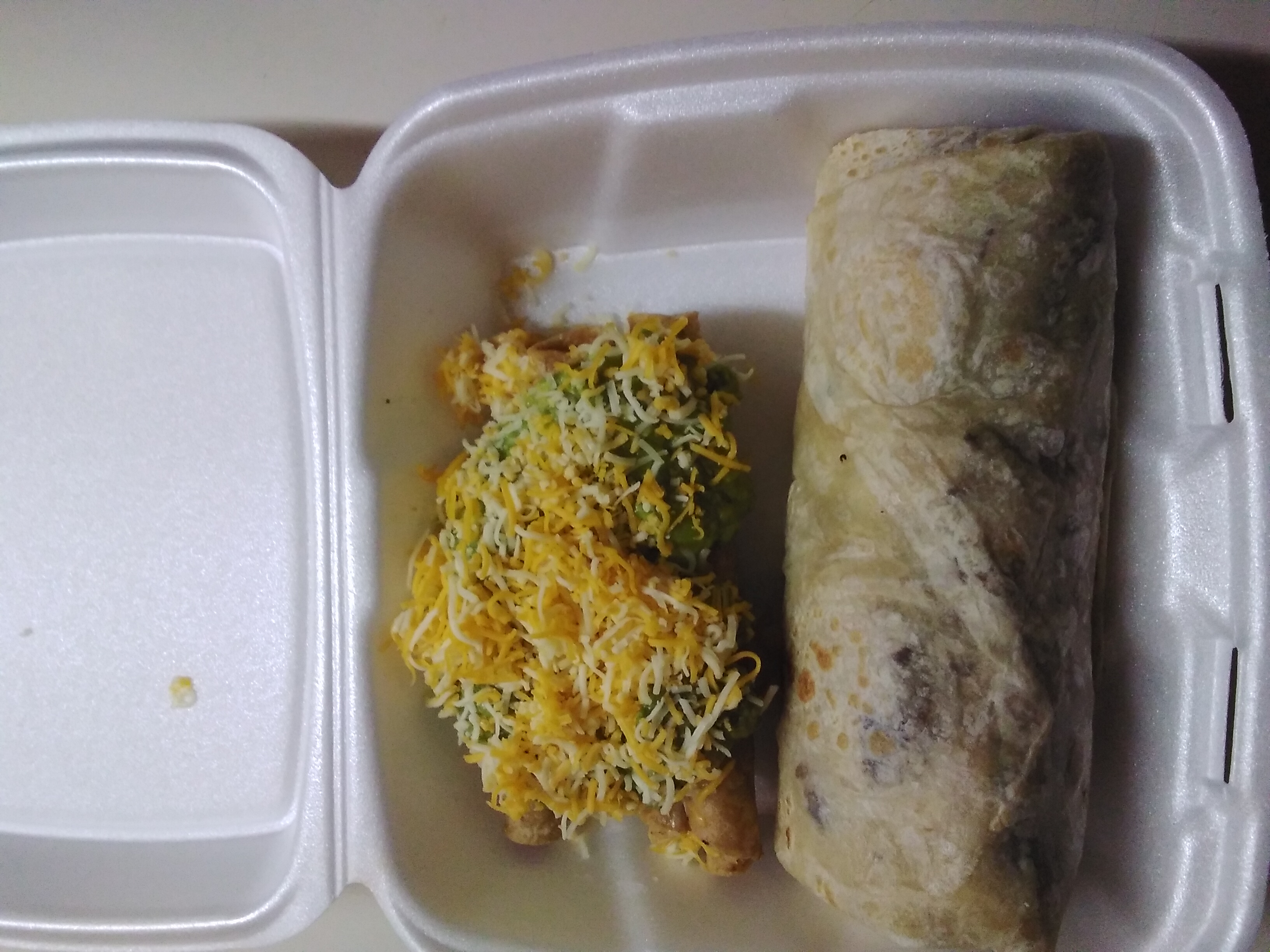 Order Carne asada burrito and 3 rolled tacos with  guacamole  food online from Rolberto Taco Shop store, San Diego on bringmethat.com
