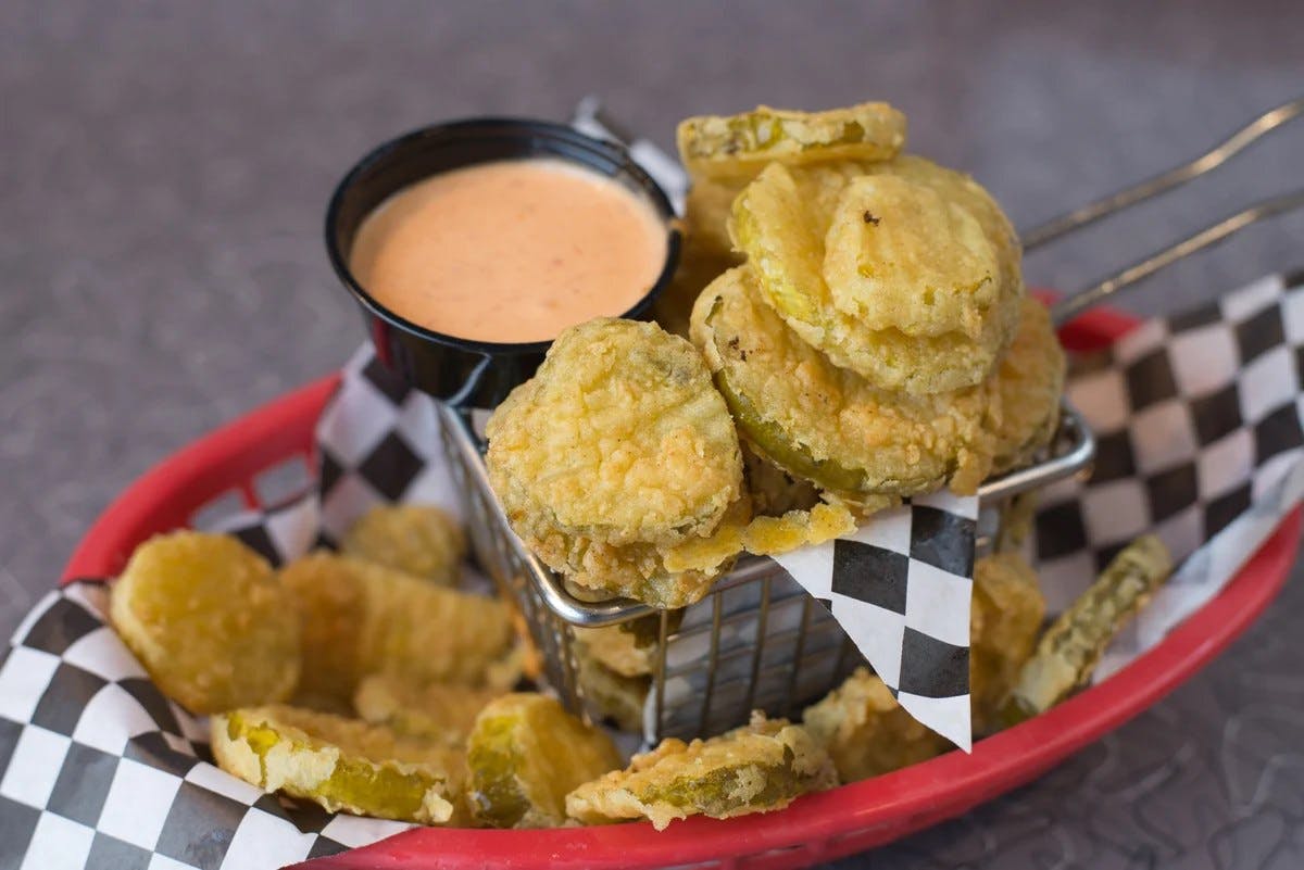 Order Fried Pickles - Side food online from Fox's Pizza Den store, Parkhill on bringmethat.com