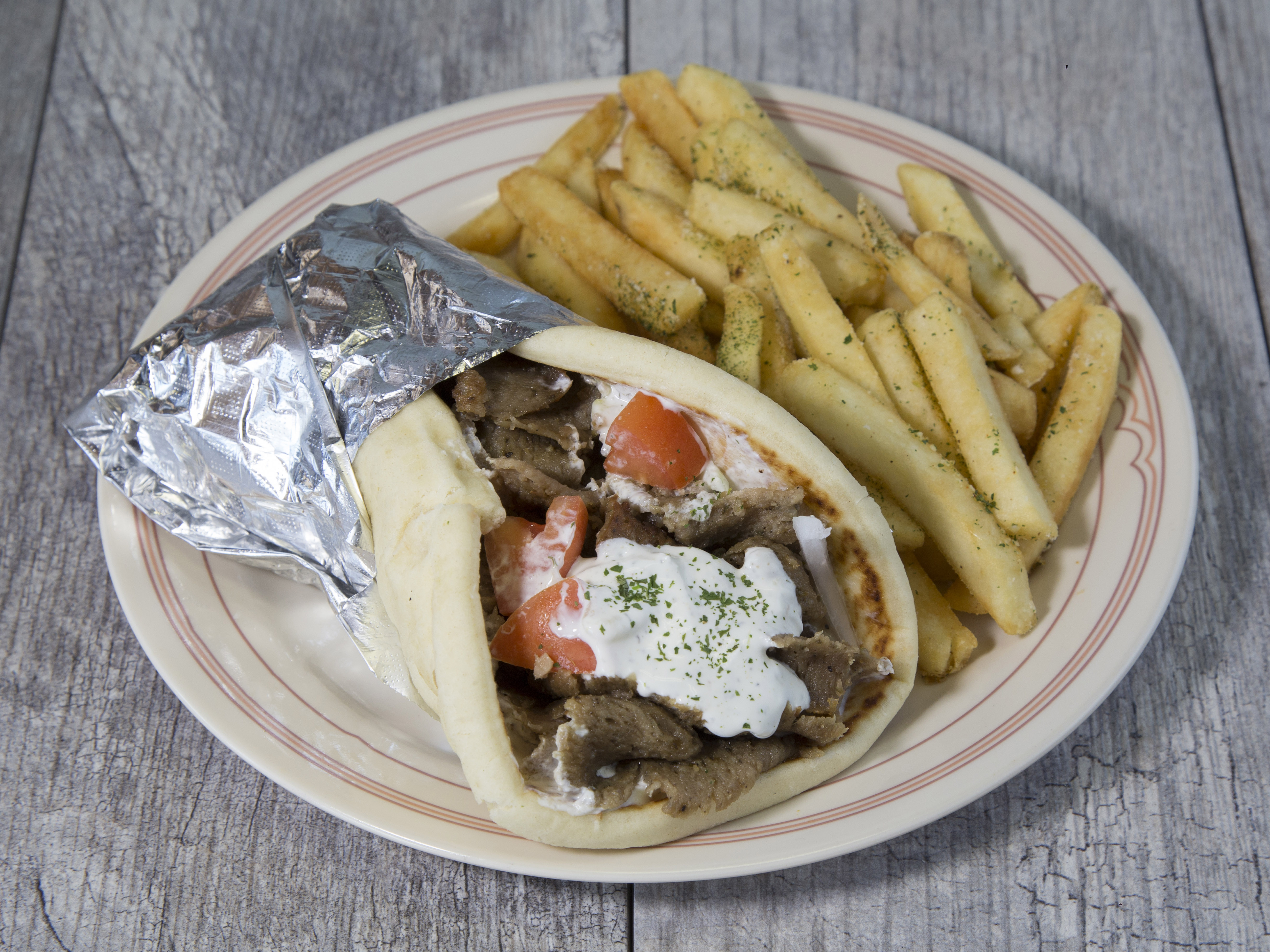 Order Original Gyro Pita Combo food online from Greek's Grill The store, Chandler on bringmethat.com