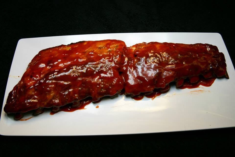 Order Baby Back Ribs - 1/2 Slab food online from Pizanoz Pizza store, Buffalo Grove on bringmethat.com