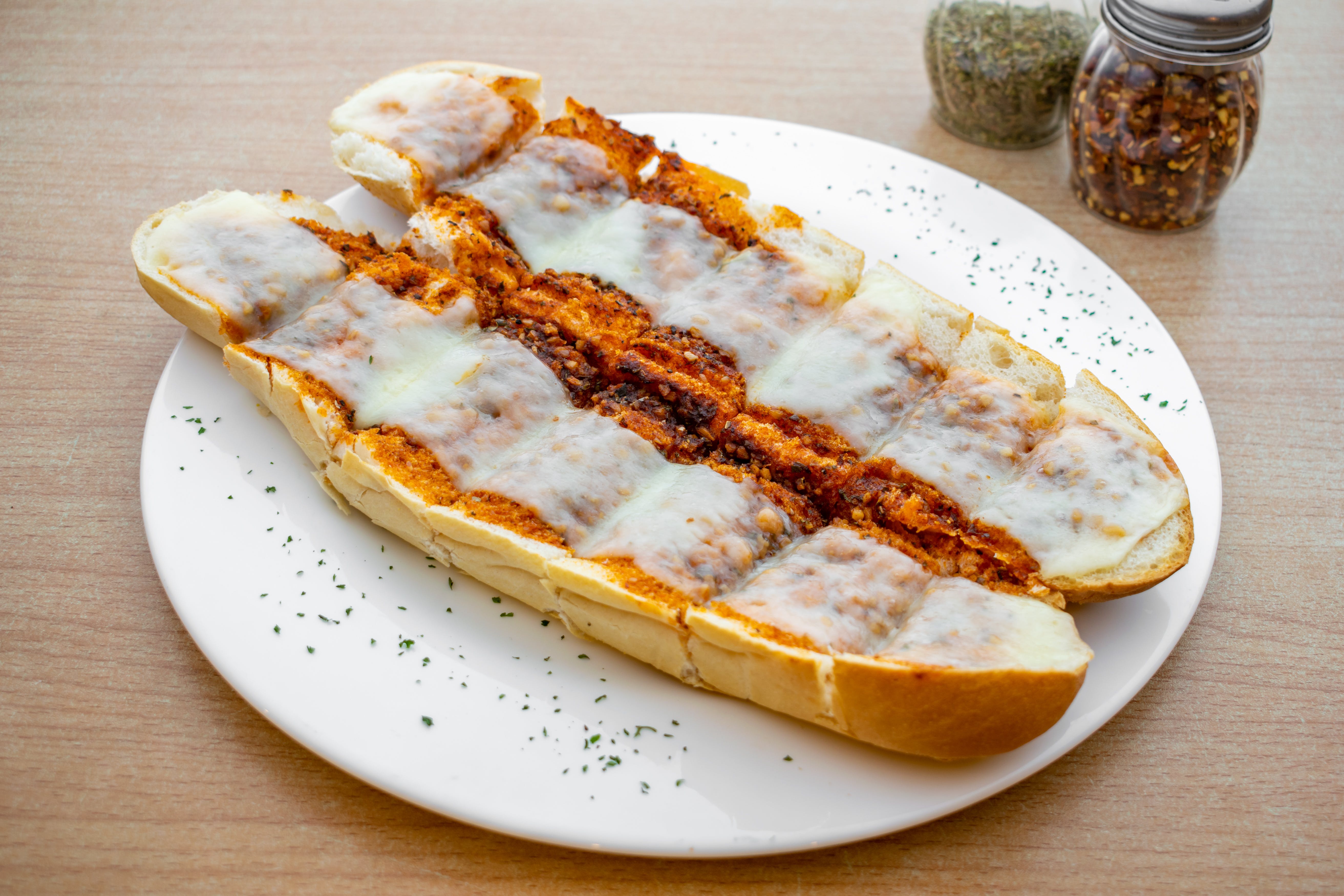 Order Garlic Bread with Cheese - Appetizer food online from Dusals store, Milltown on bringmethat.com