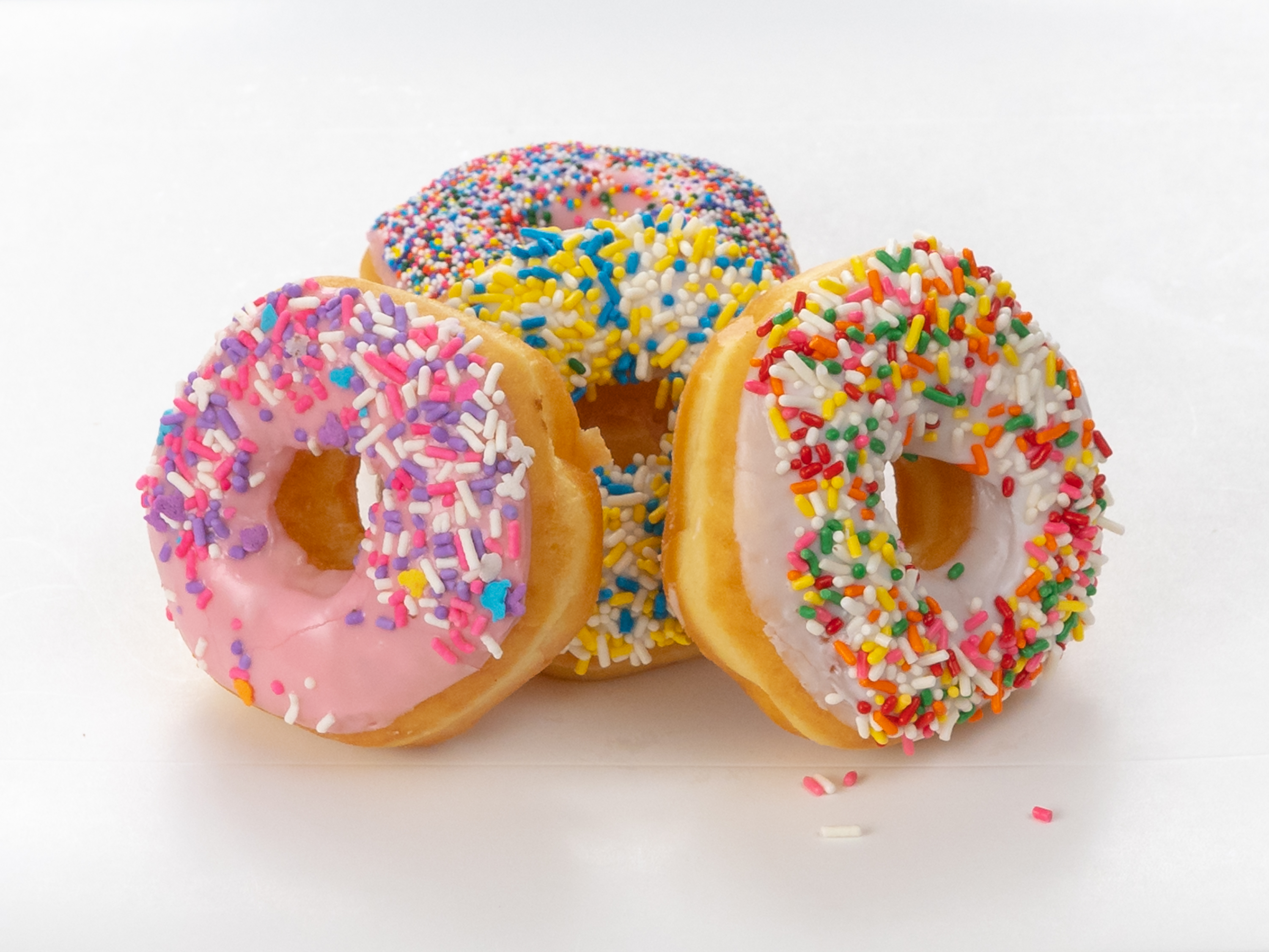 Order Sprinkled Donut food online from Good Morning Donuts store, Coppell on bringmethat.com
