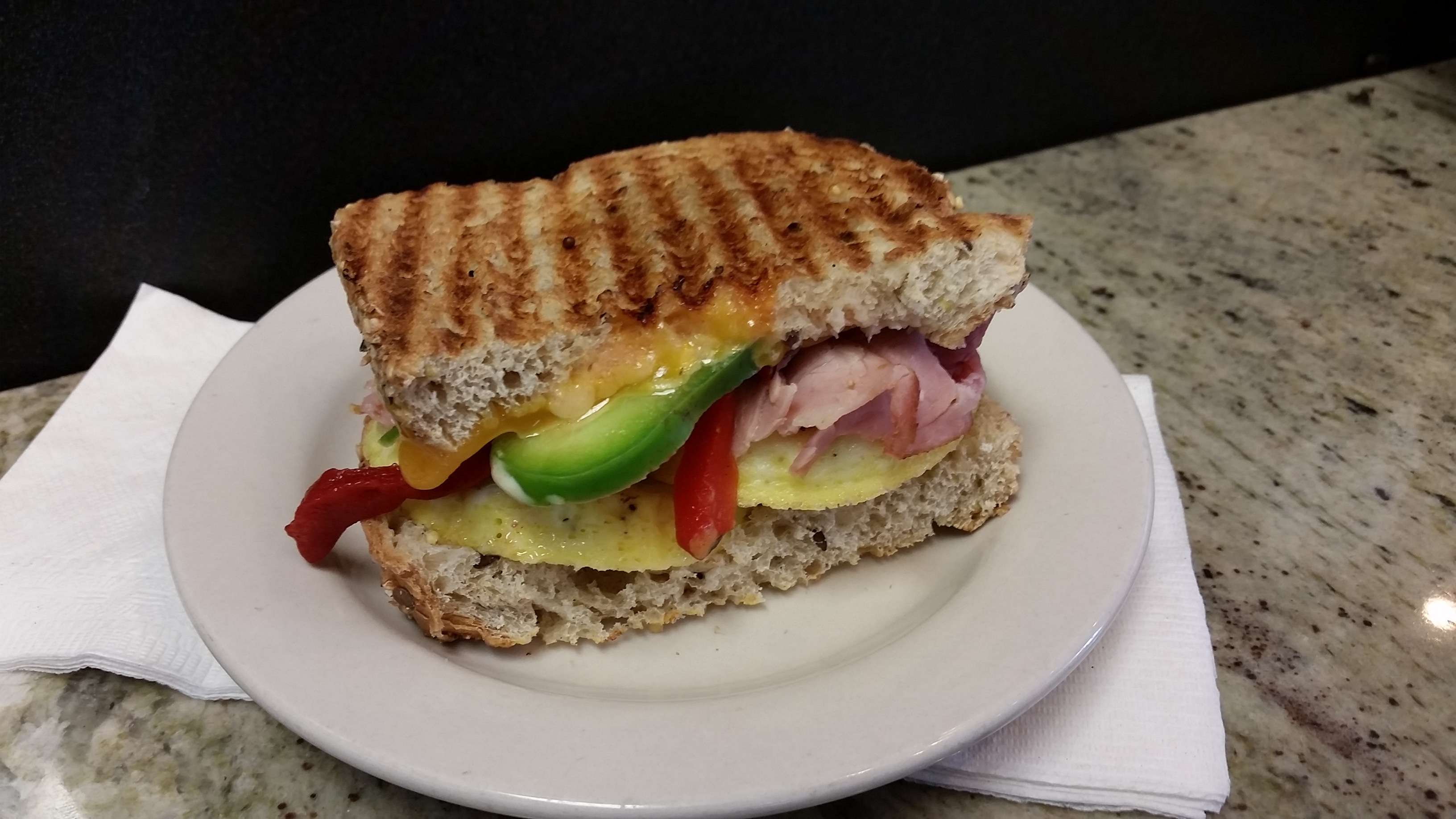 Order Breakfast Panini food online from Daily Dose Cafe and Espresso store, Minneapolis on bringmethat.com