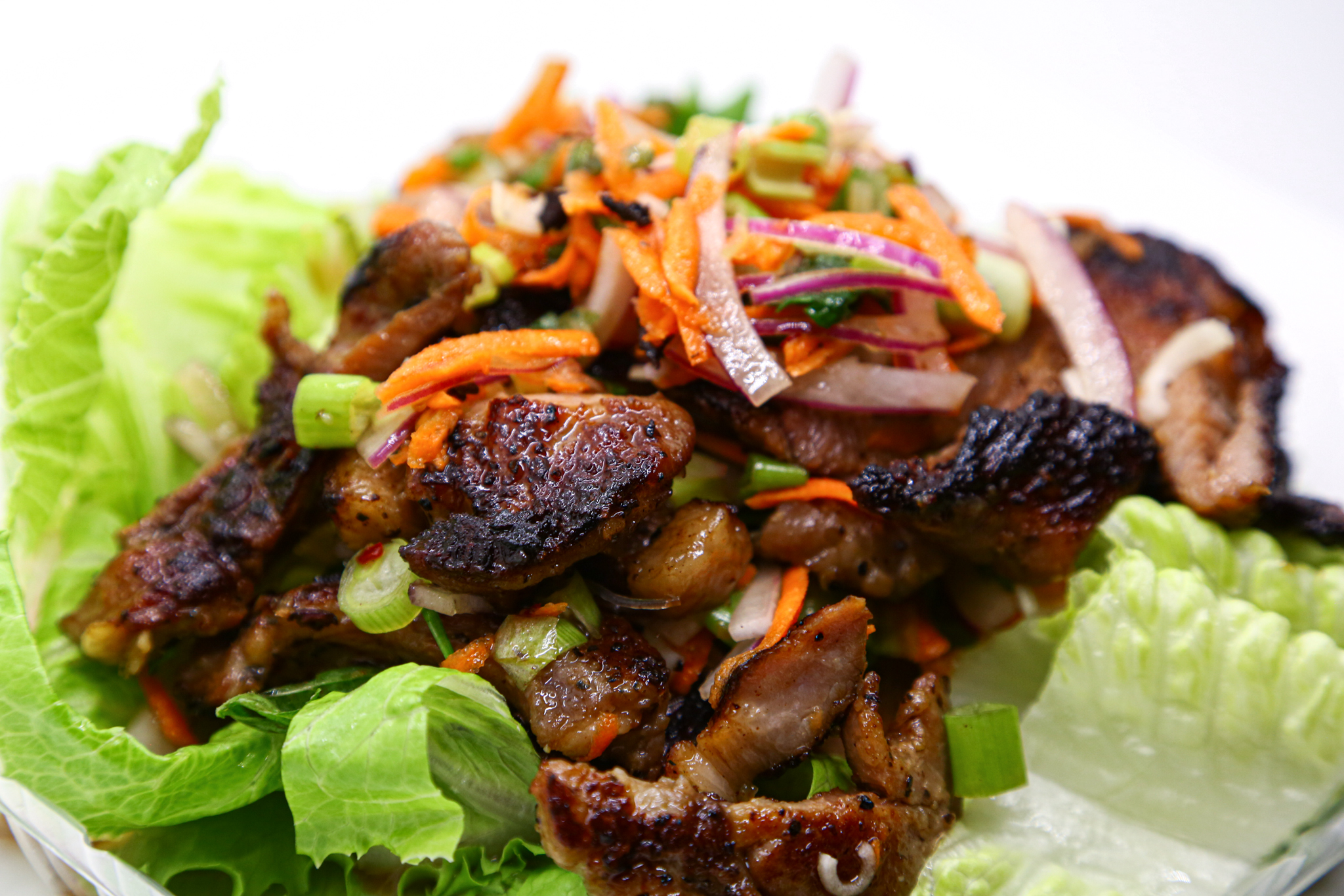 Order BBQ Pork (Moo Yang) หมูย่าง food online from Patpong Thai Cuisine store, San Francisco on bringmethat.com