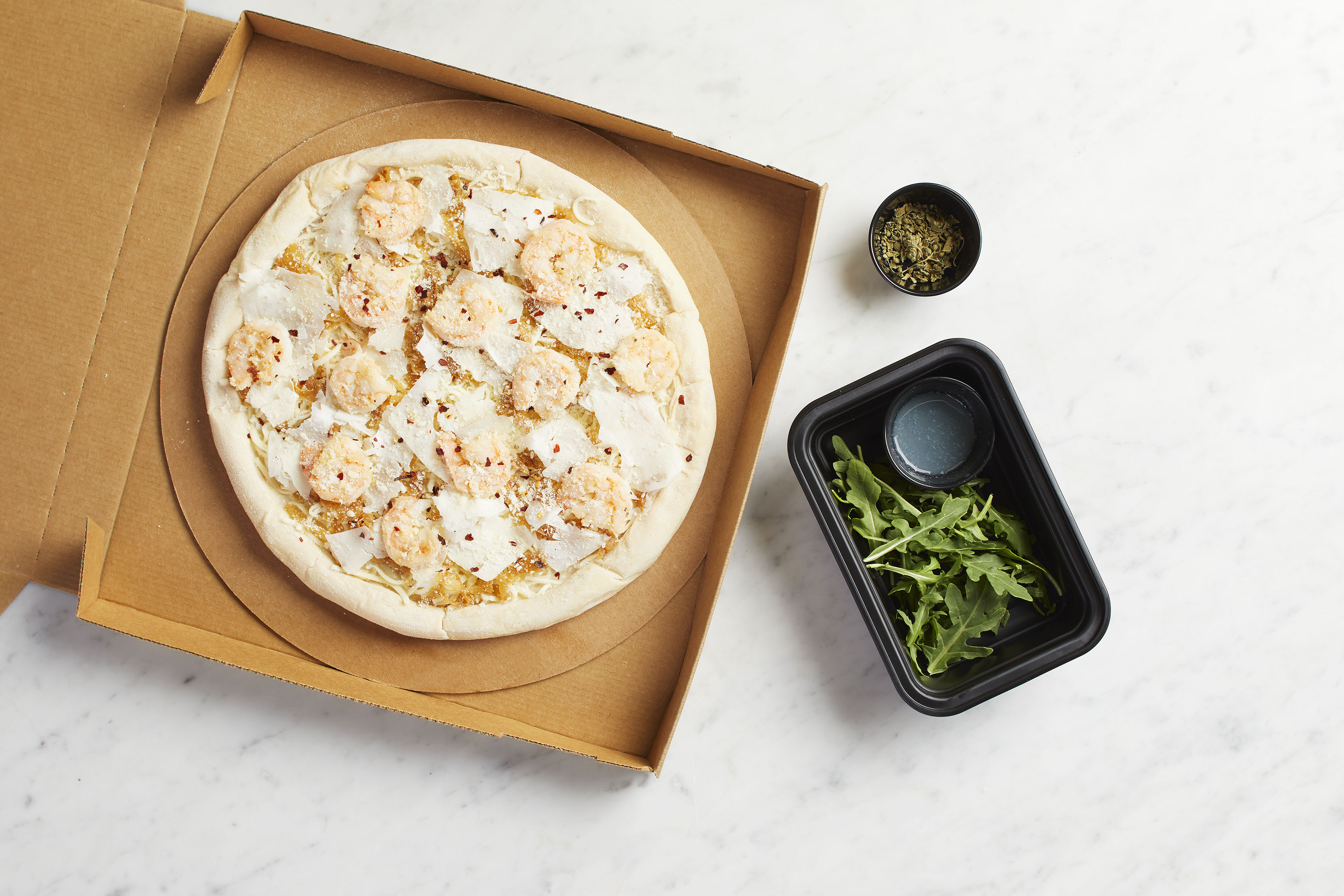 Order Take and Bake Shrimp Scampi Pizza  food online from California Pizza Kitchen - River City Dr store, Jacksonville on bringmethat.com