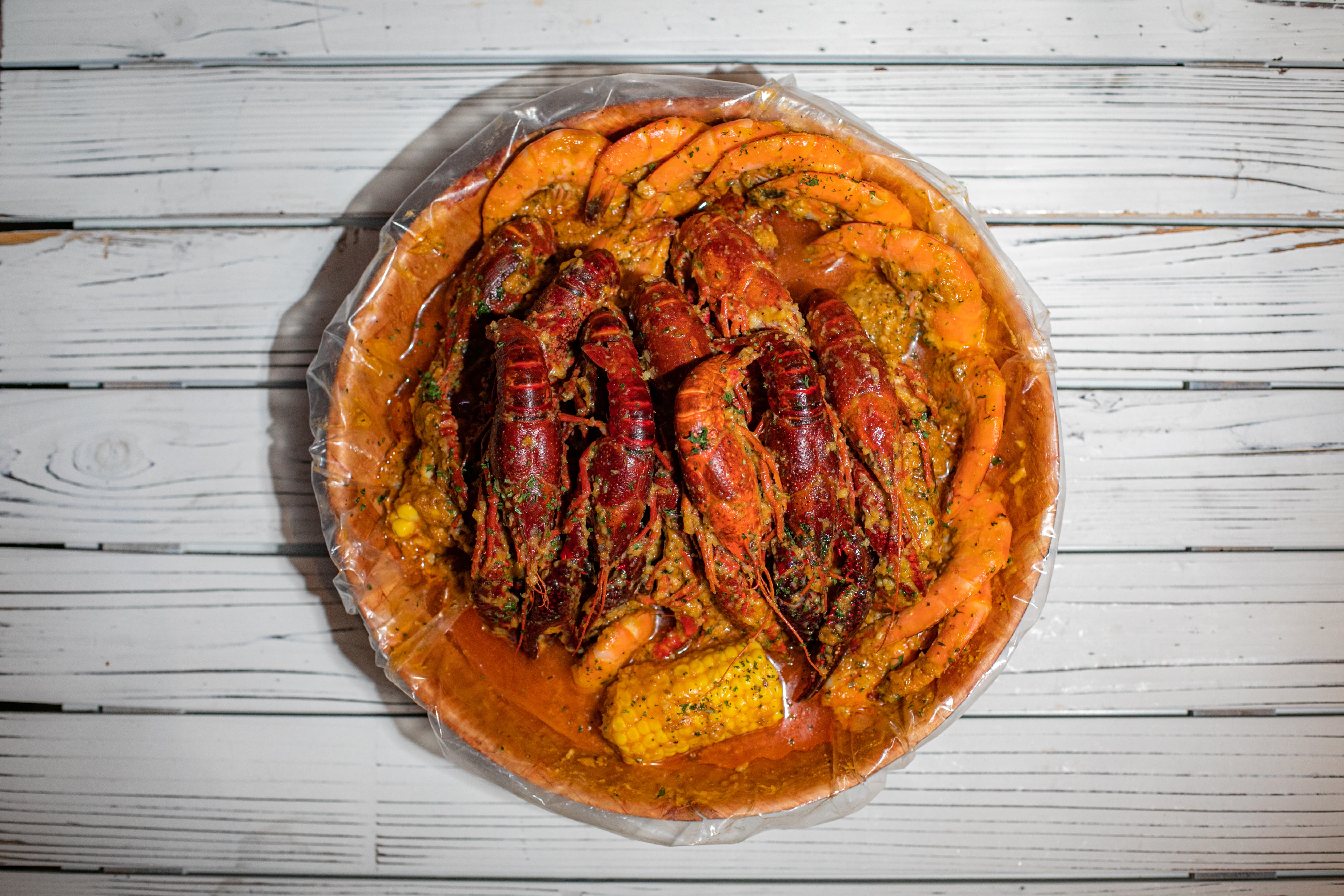Order A. 1 lb. Crawfish and 1 lb. Shrimp Head Off Combo food online from Ben's Crab store, Uniondale on bringmethat.com