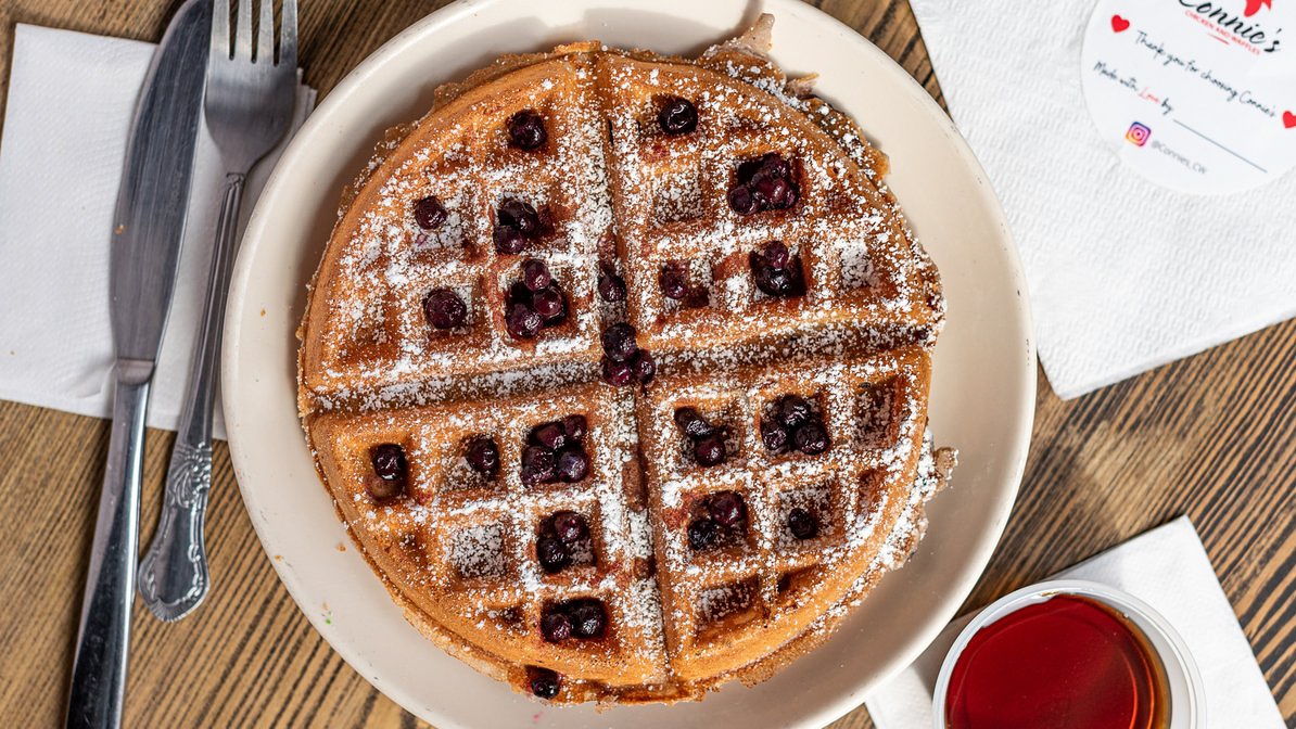 Order Blueberry Waffle food online from Connie's Chicken & Waffles Charles store, Baltimore on bringmethat.com