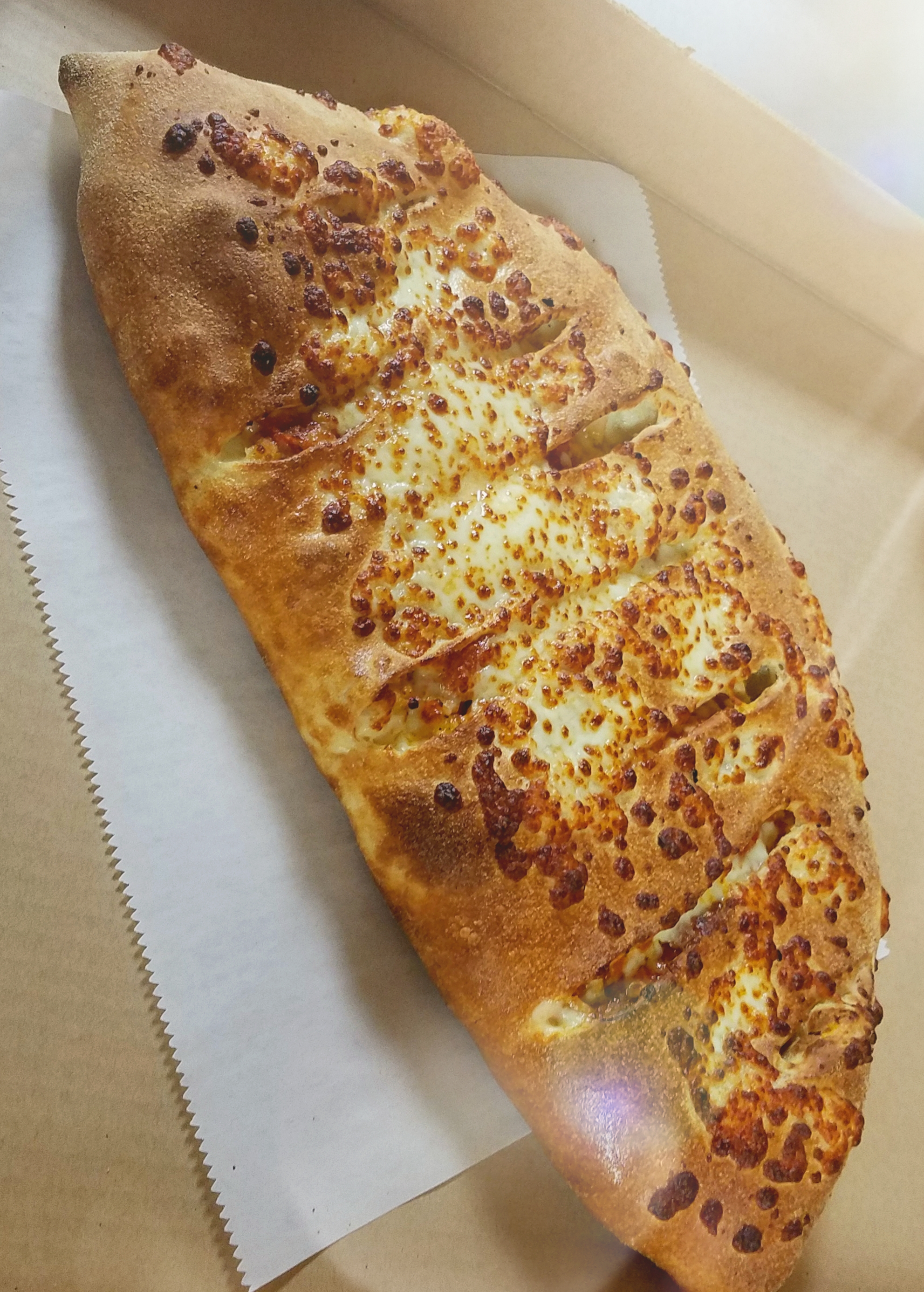 Order Chicken Bomb Calzone food online from Gregory House Of Pizza store, Belmont on bringmethat.com