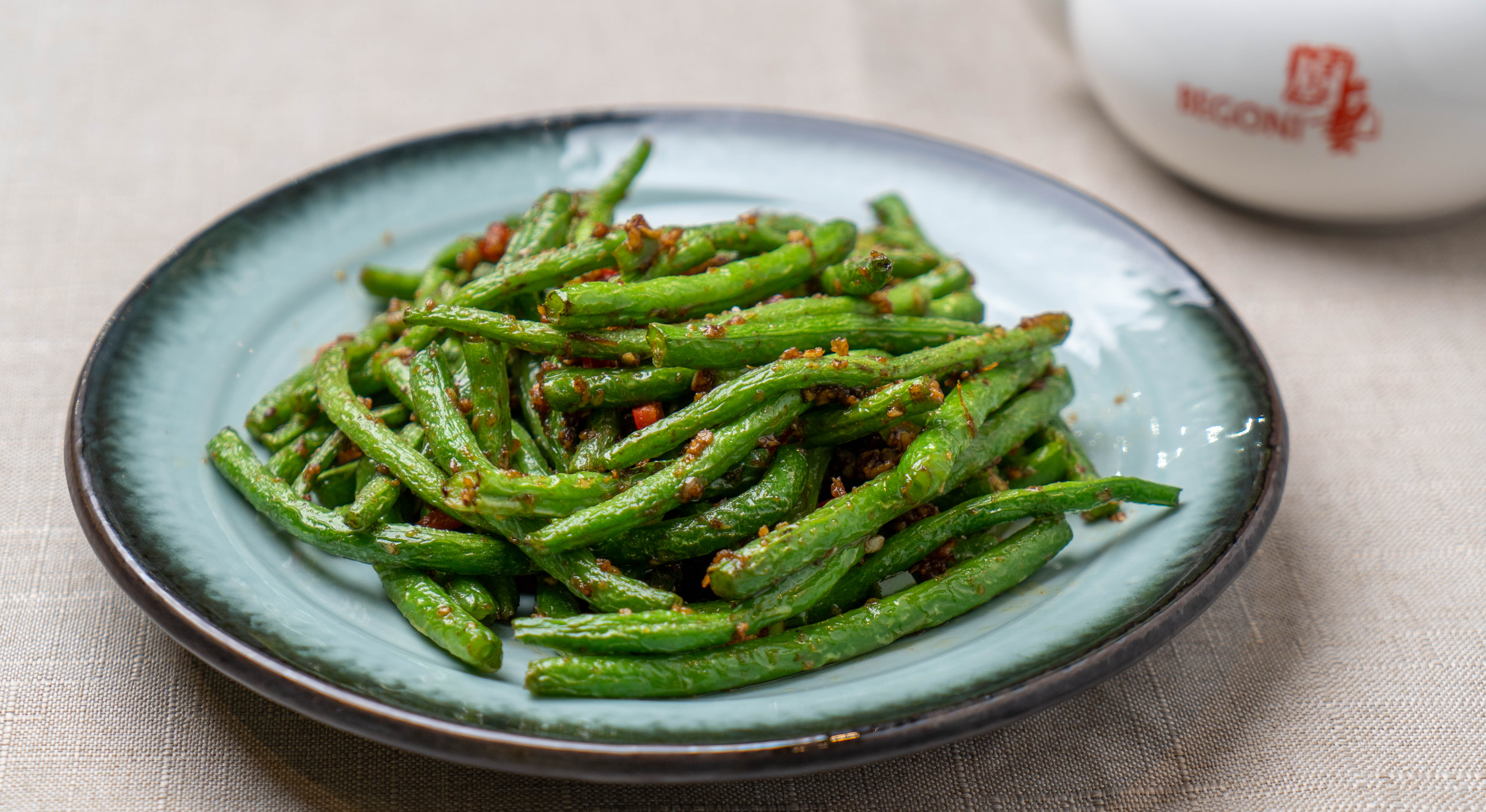 Order V9. String Beans with XO Sauce food online from Begoni Bistro store, San Francisco on bringmethat.com
