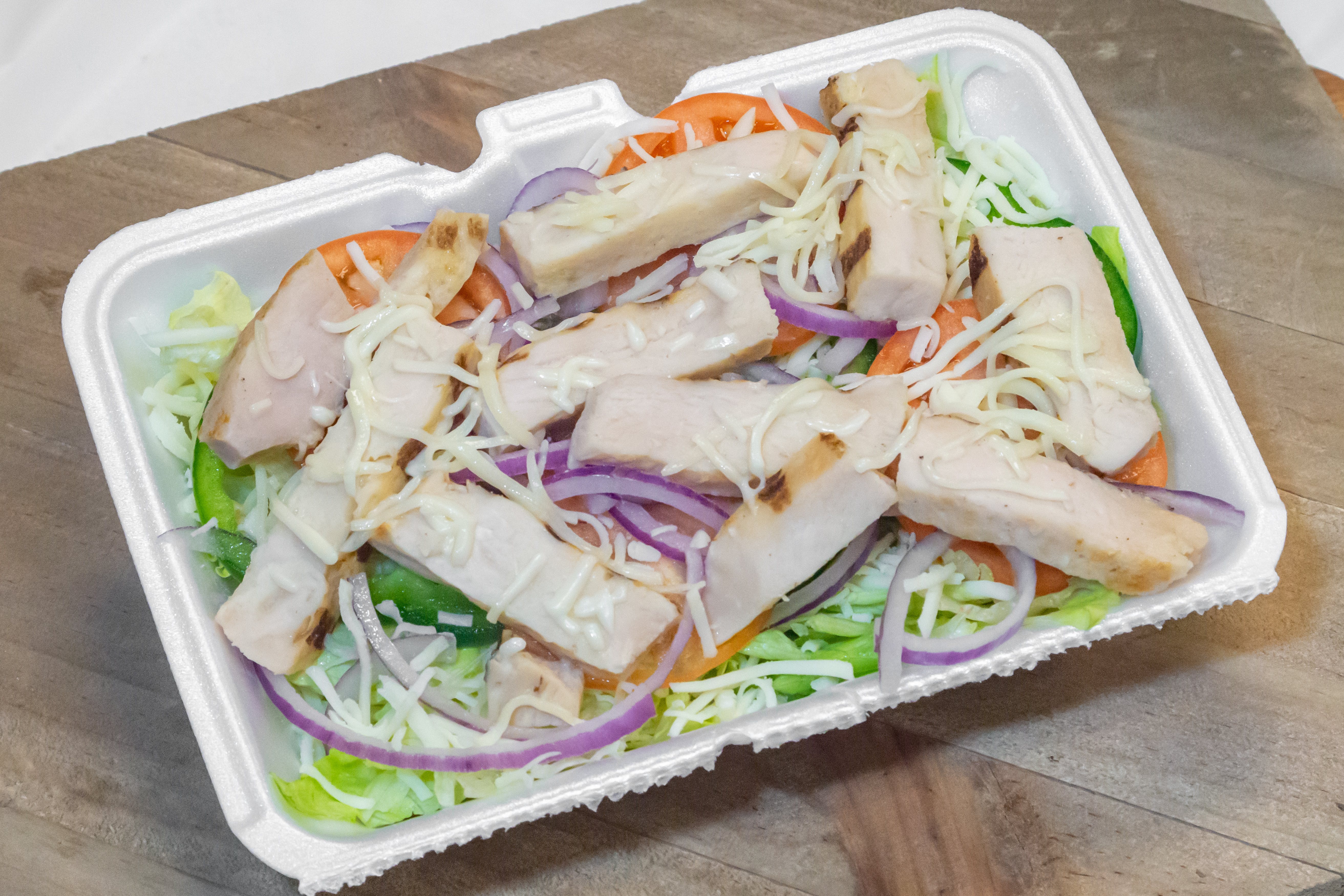 Order Grilled Chicken Salad - Salad food online from Grandslam Pizza store, Plum on bringmethat.com