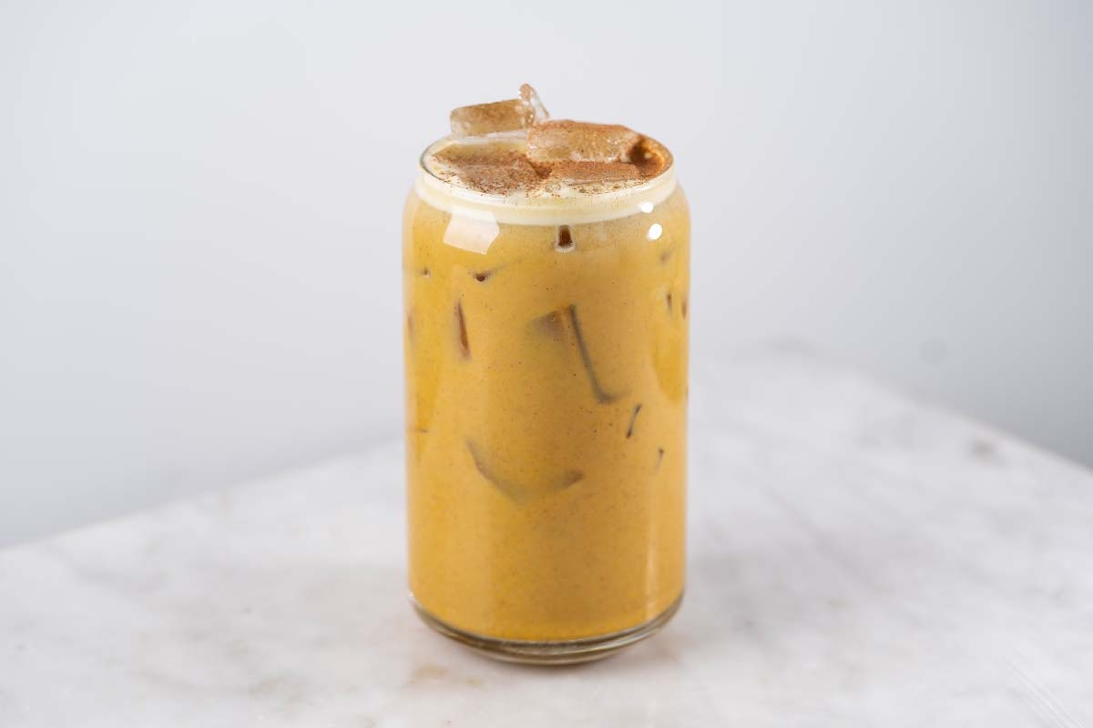 Order Iced Golden Latte food online from Bluestone Lane Cafe store, Armonk on bringmethat.com