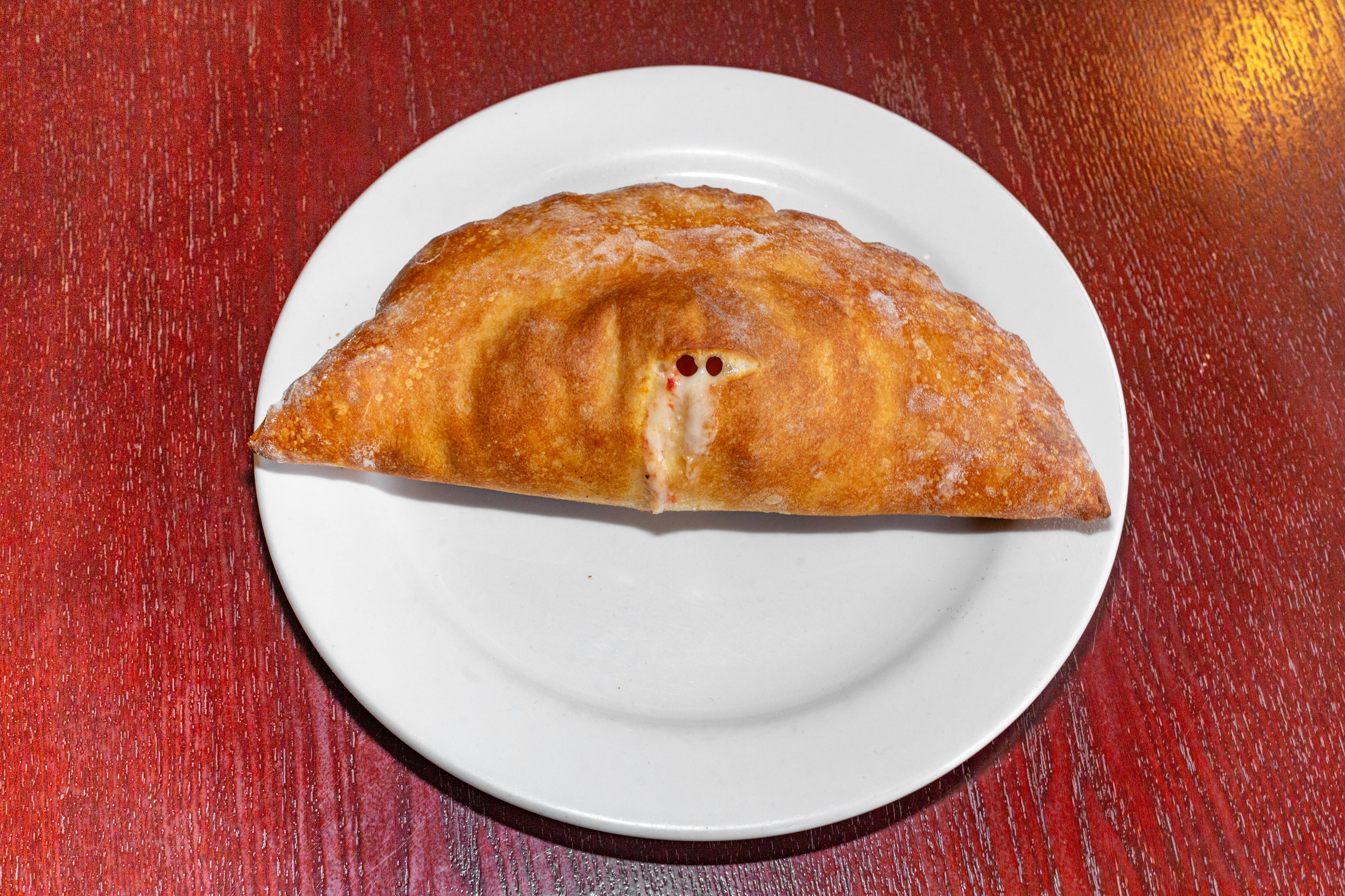 Order Sausage Roll - Calzones, Turnovers & Rolls food online from Silvana Italian Cuisine store, Pennsville on bringmethat.com
