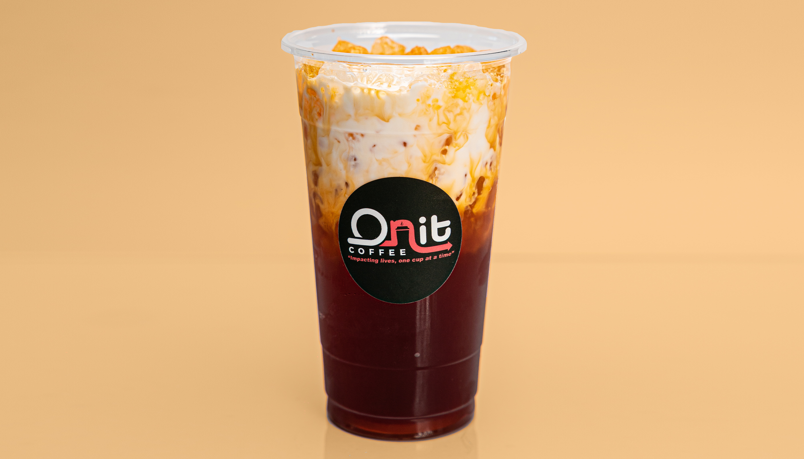 Order Iced Thai Tea food online from Onit Coffee store, Elk Grove on bringmethat.com