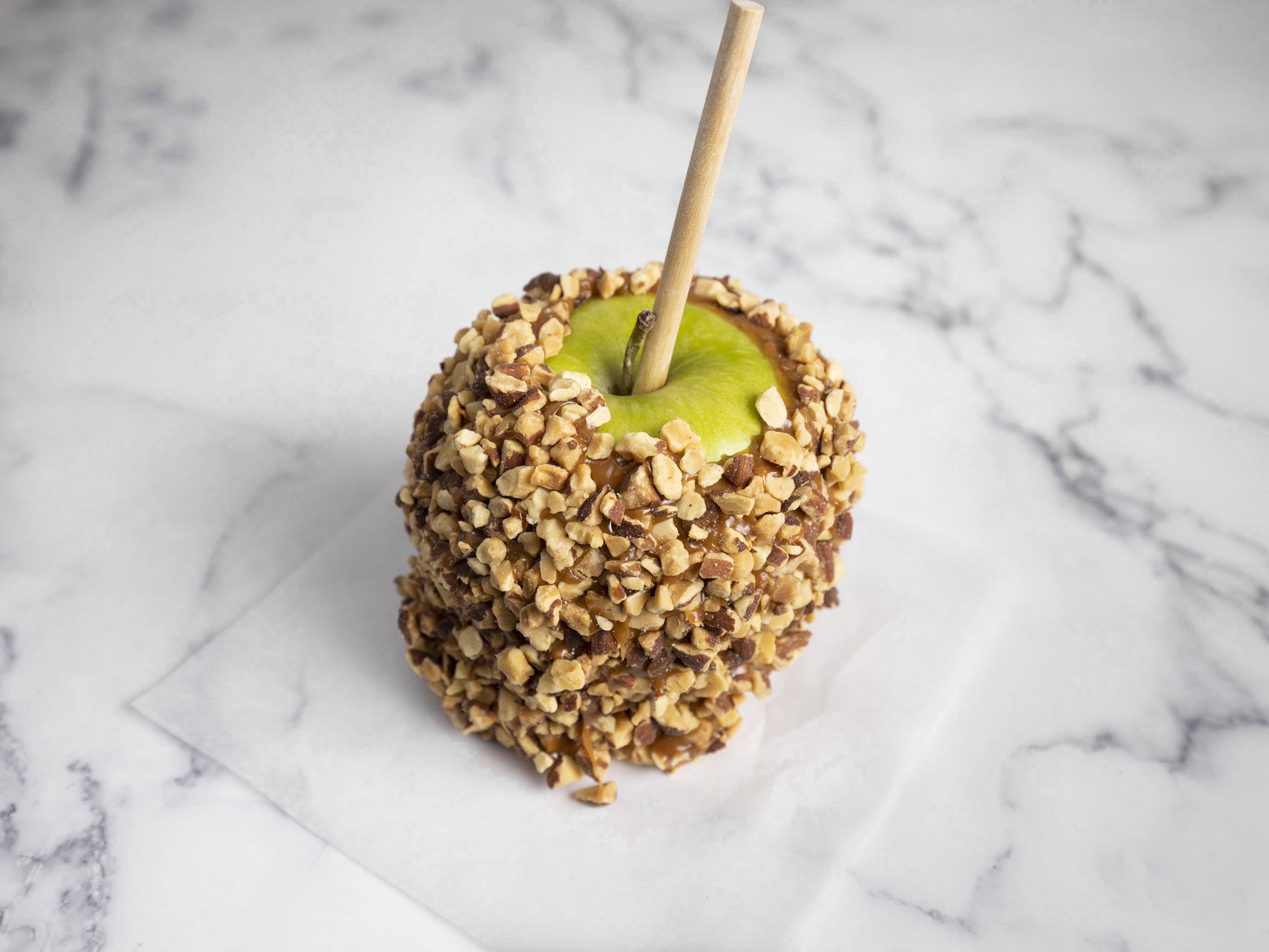 Order Caramel Apple with Almonds food online from San Francisco Chocolate Store store, San Francisco on bringmethat.com