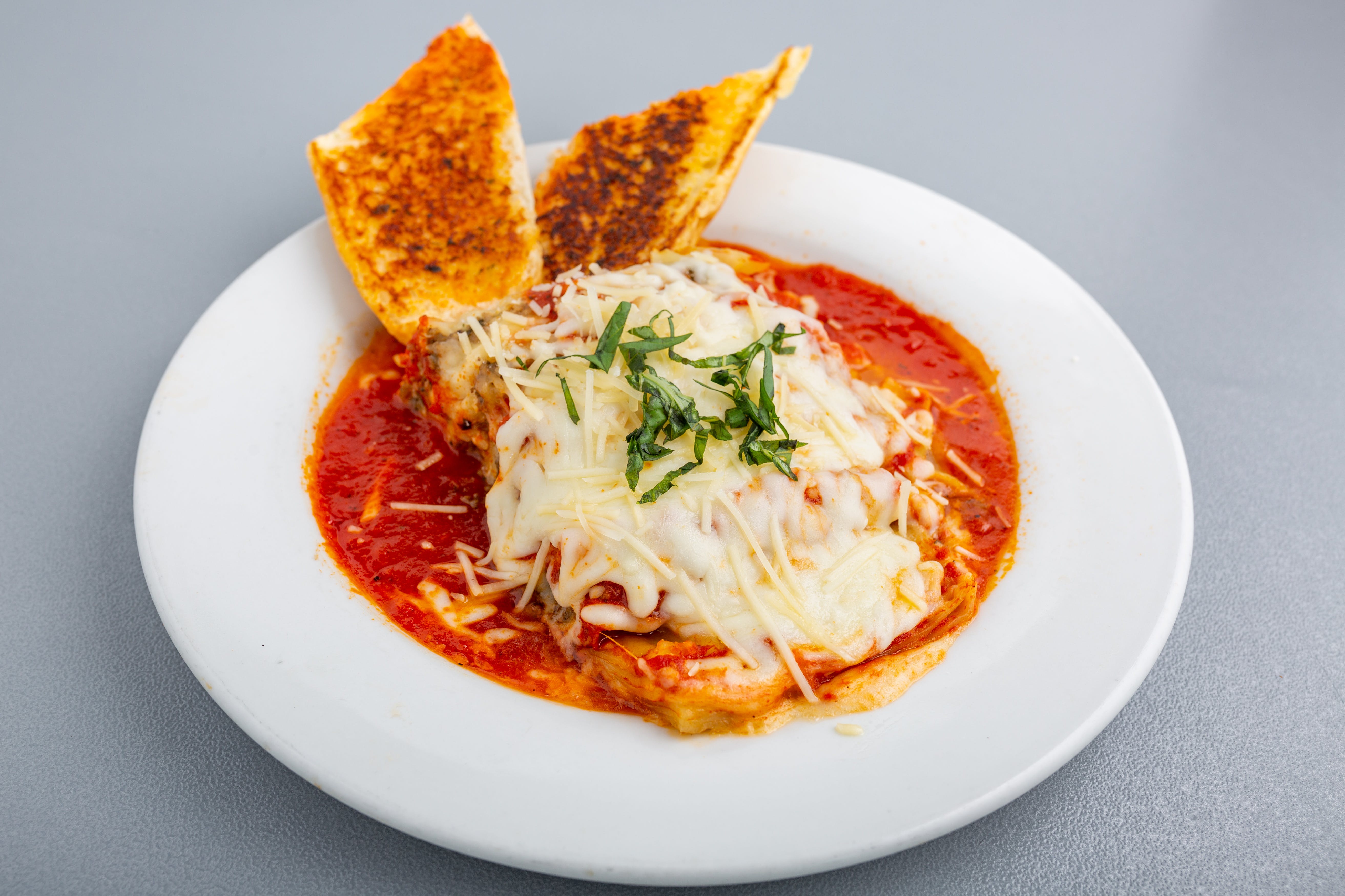 Order Lasagna - Entree food online from Napoli Pizza store, Henderson on bringmethat.com