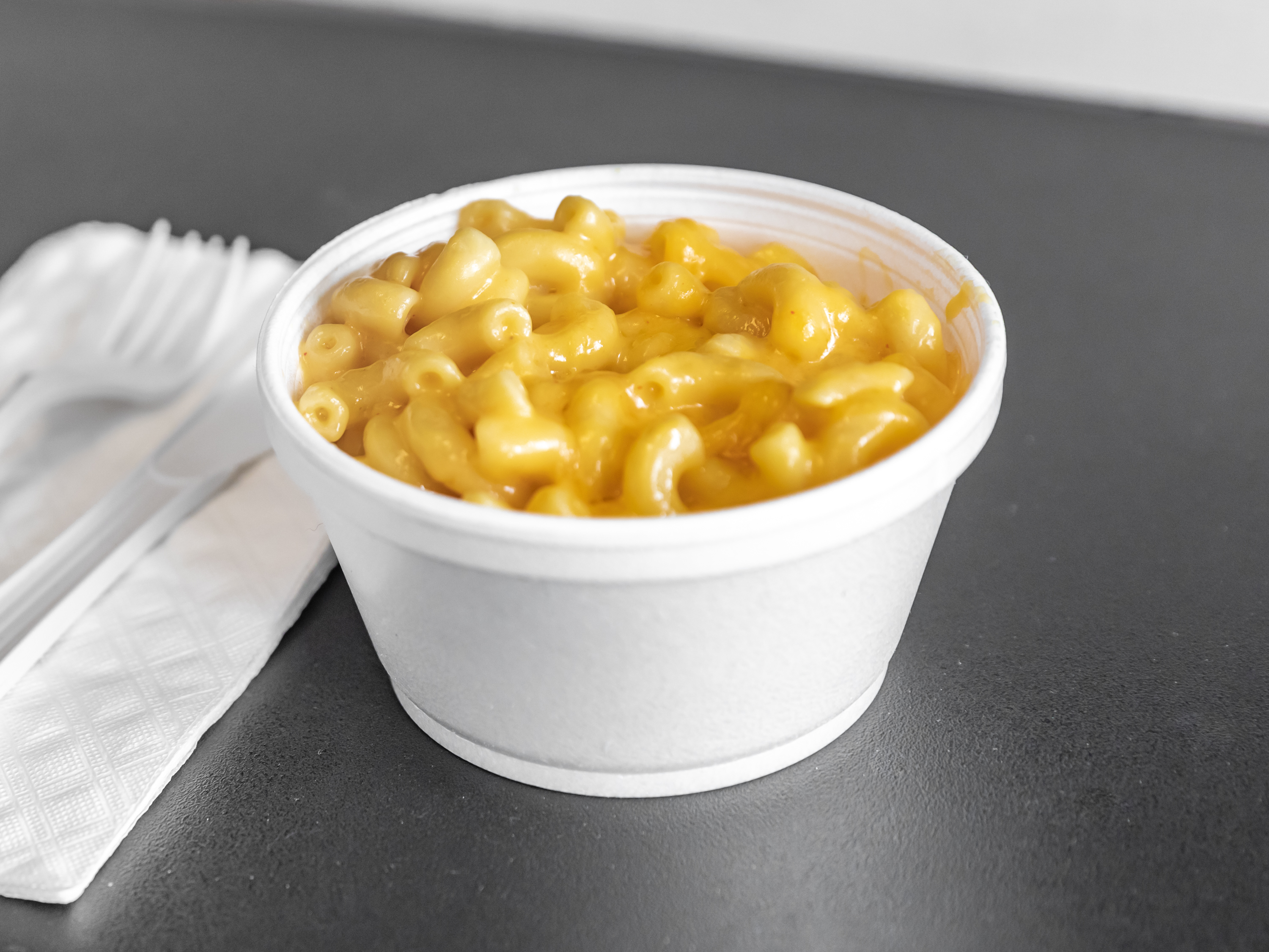 Order Baked Mac and Cheese food online from Smokin Bbq store, Mundelein on bringmethat.com
