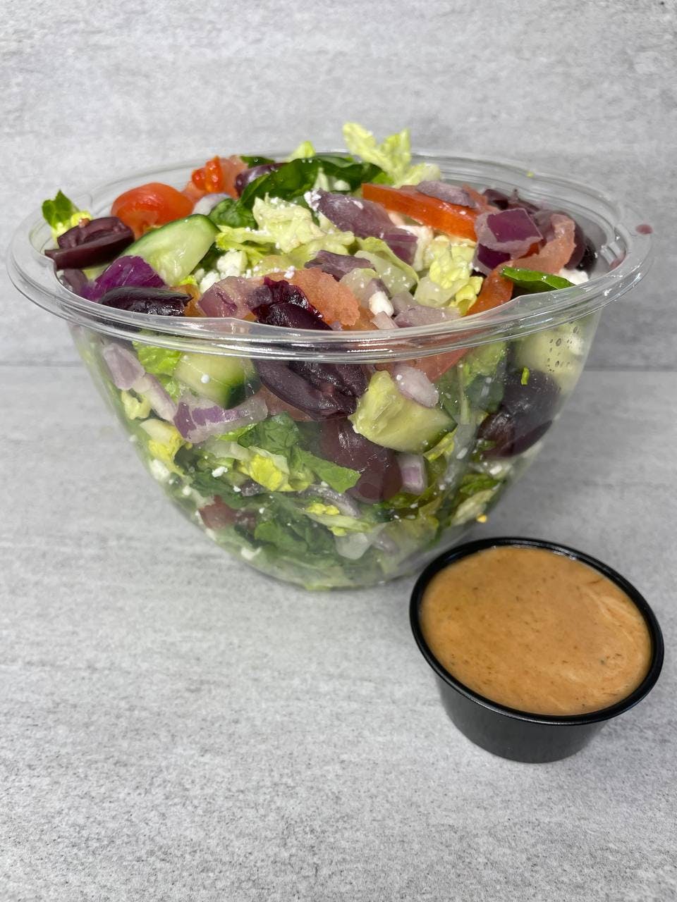 Order Greek Salad - Salad food online from Troys Italian Kitchen store, Arlington on bringmethat.com