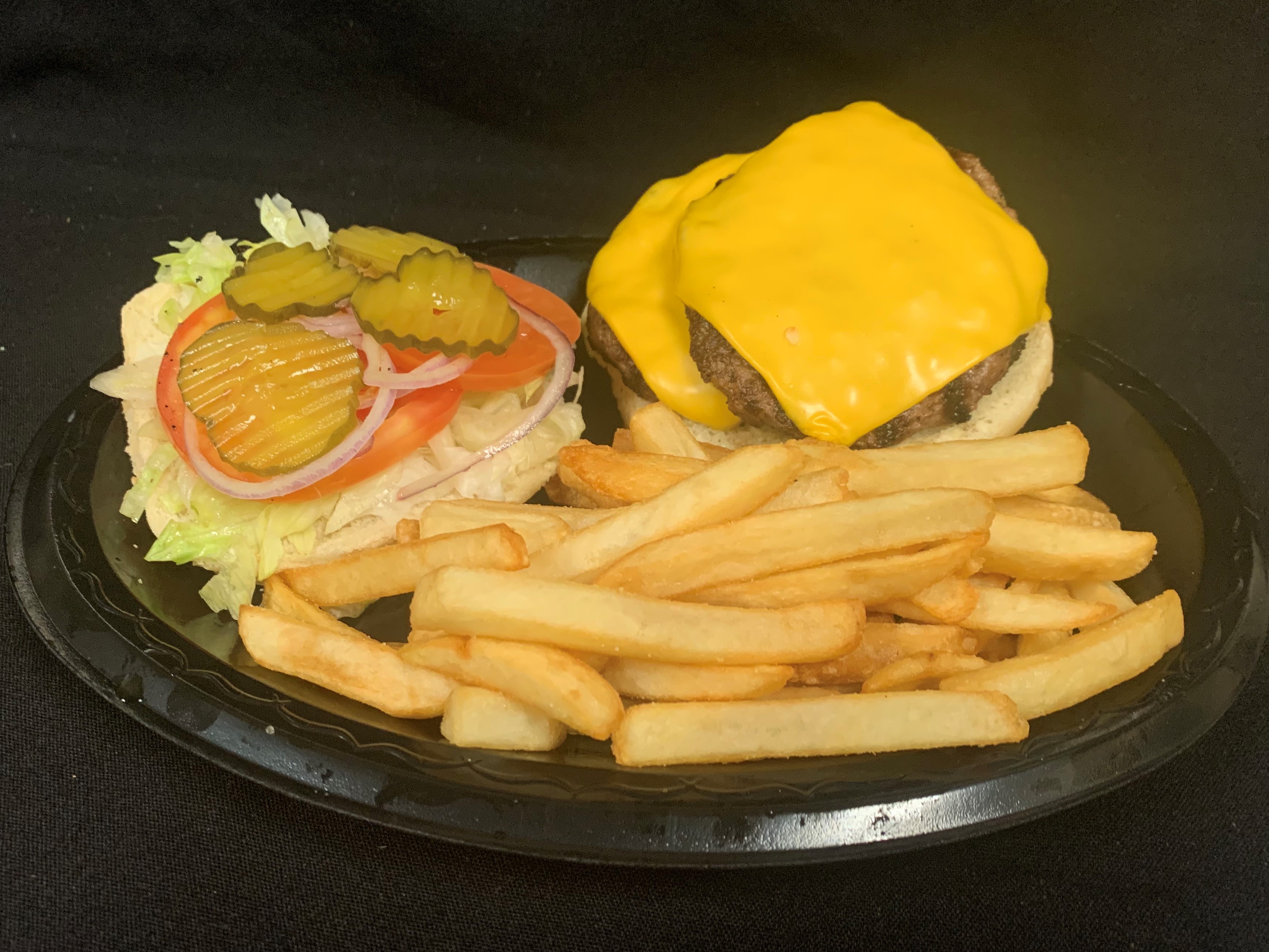 Order Big Burger Basket w/ French Fries food online from Tony Subs & Pizza store, Inglewood on bringmethat.com