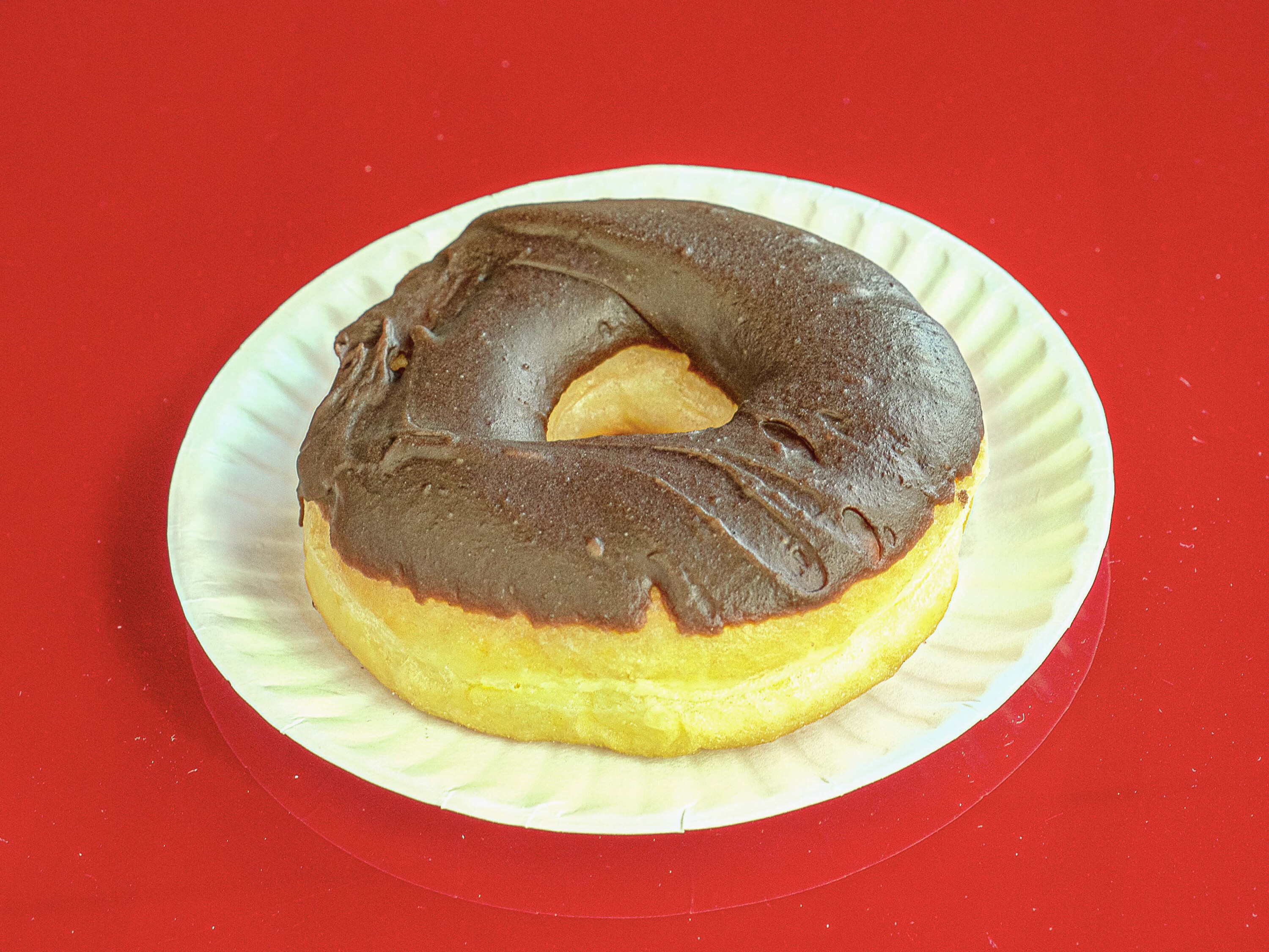 Order Chocolate iced yeast Donut food online from Hammer Donuts store, Lafayette on bringmethat.com