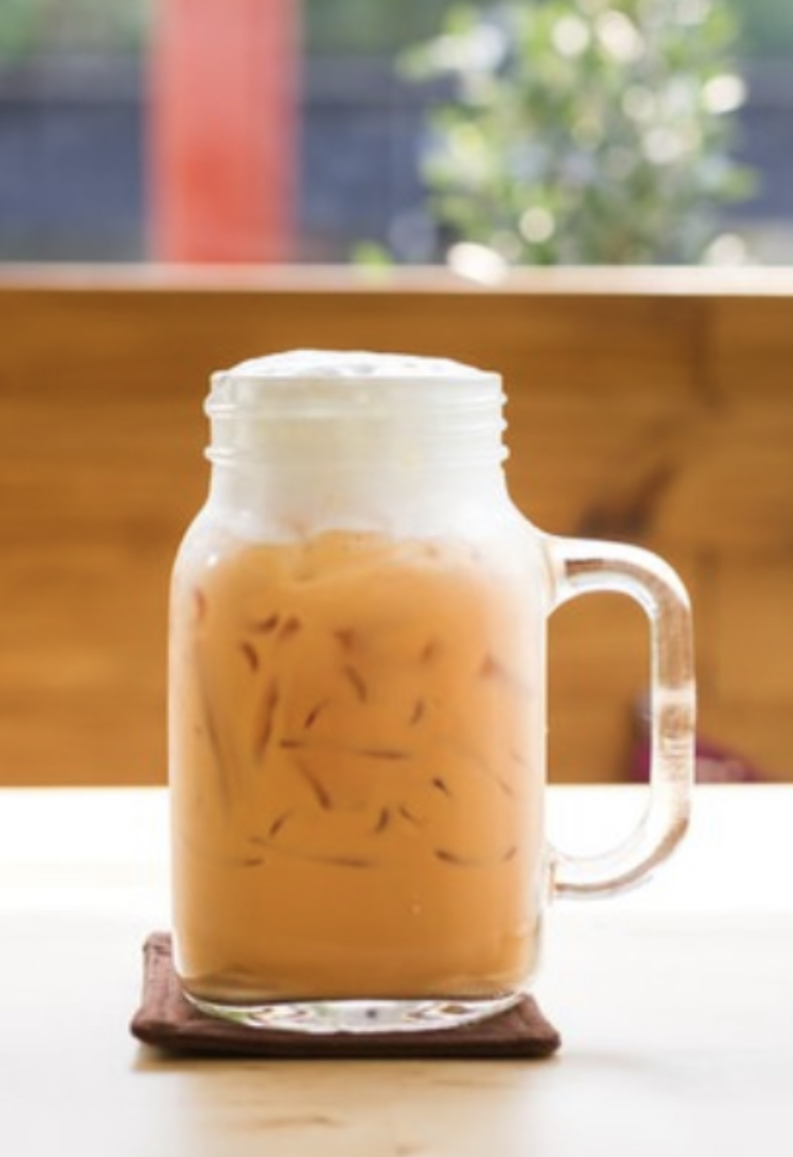 Order Thai Iced Tea food online from Fat Noodles store, Chicago on bringmethat.com