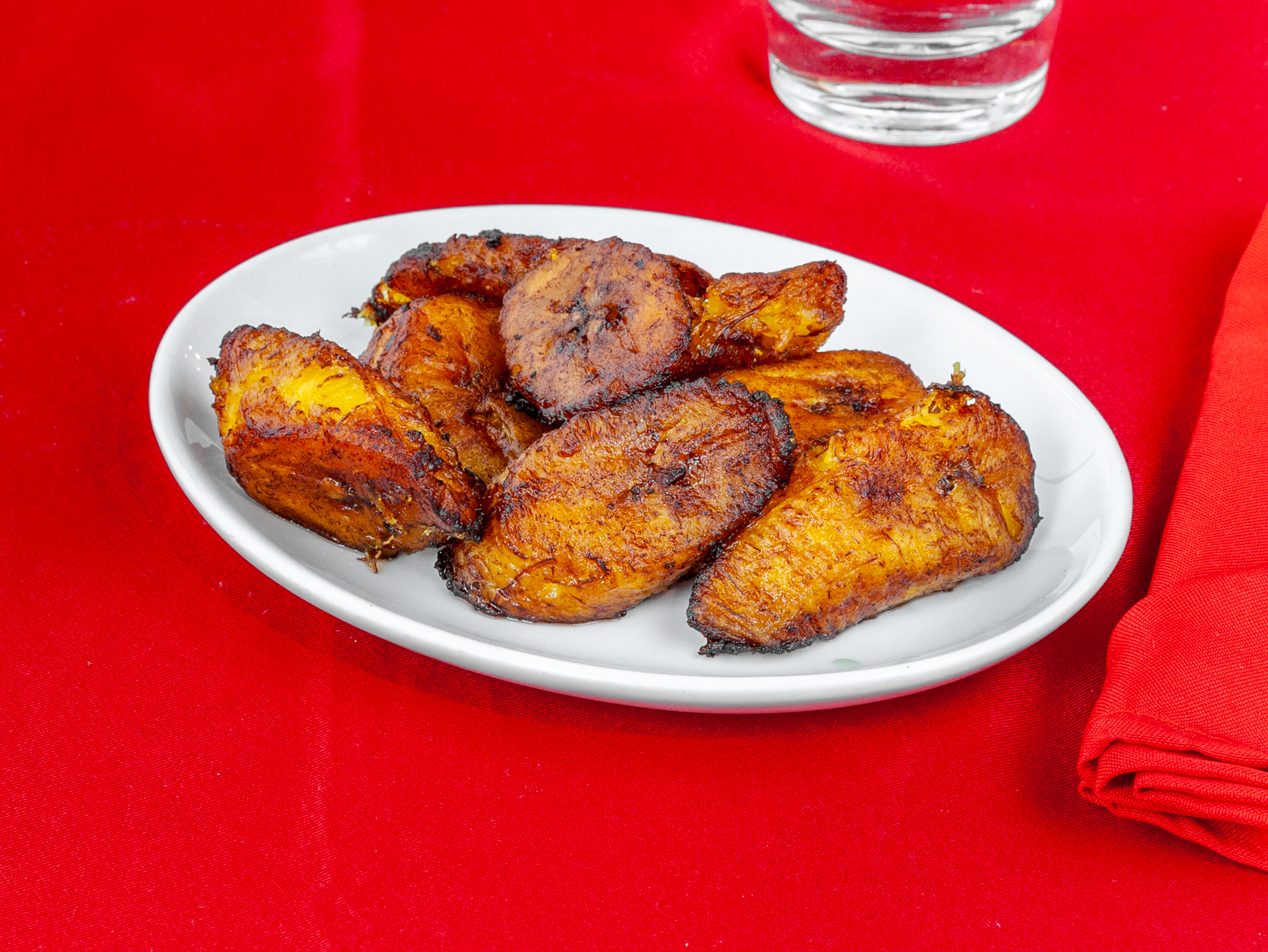 Order Plantains food online from Ja' Grill Hyde Park store, Chicago on bringmethat.com