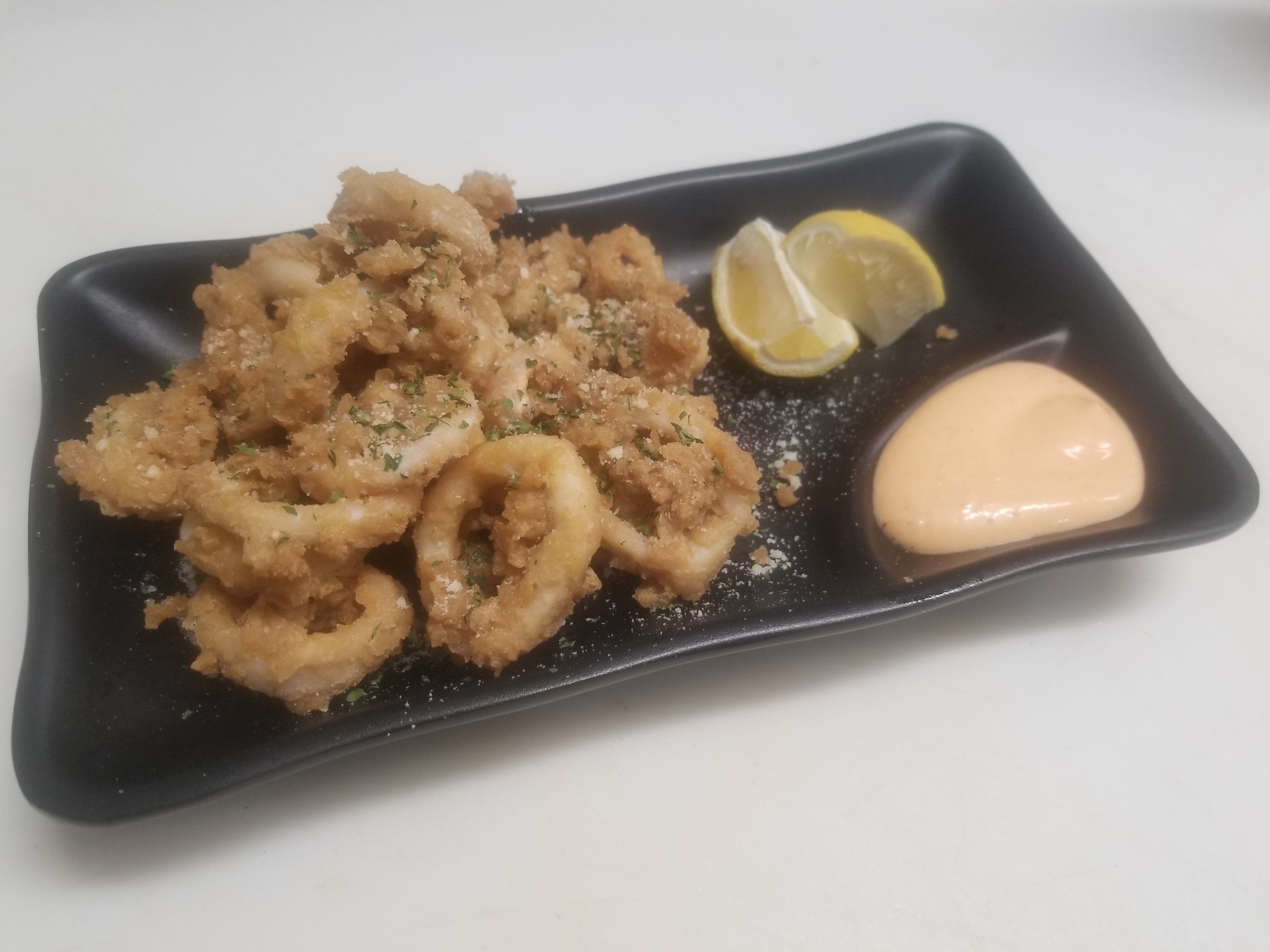 Order A4. Fried Calamari food online from ChinGoo restaurant store, Brooklyn on bringmethat.com