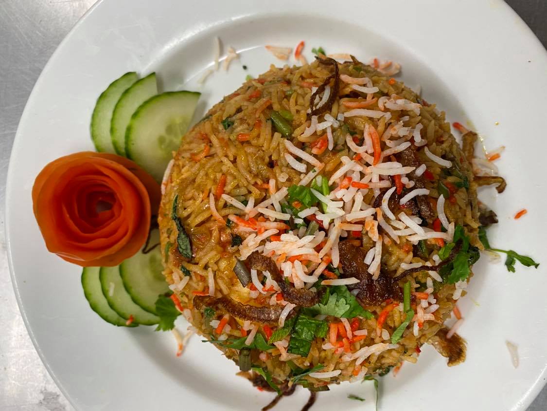 Order Hyderabadi Vegetable Biryani food online from Mount Everest Restaurant - Belair Rd. store, Baltimore on bringmethat.com