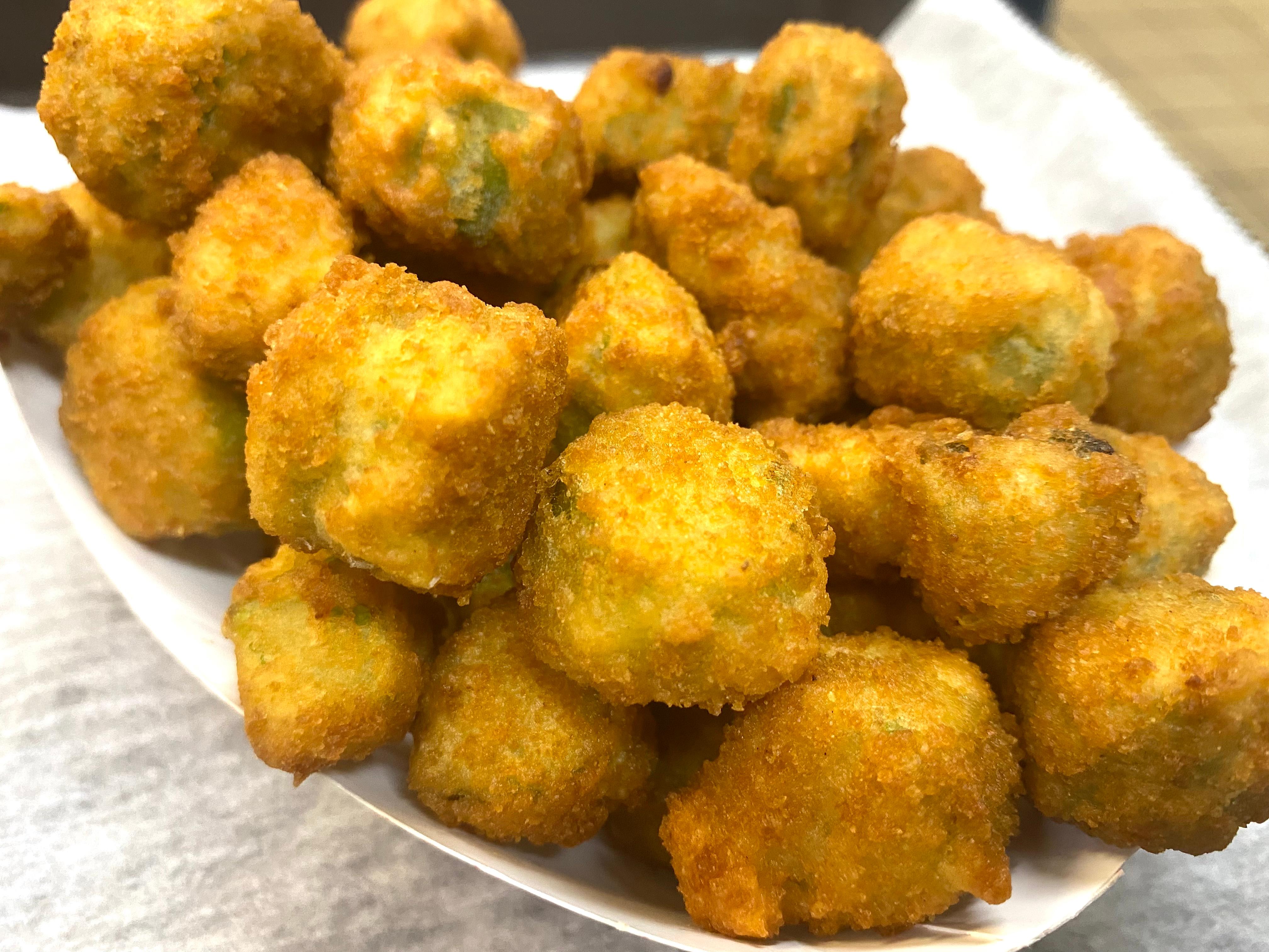 Order Fried Okra food online from Mckenzie's Barbeque store, Conroe on bringmethat.com