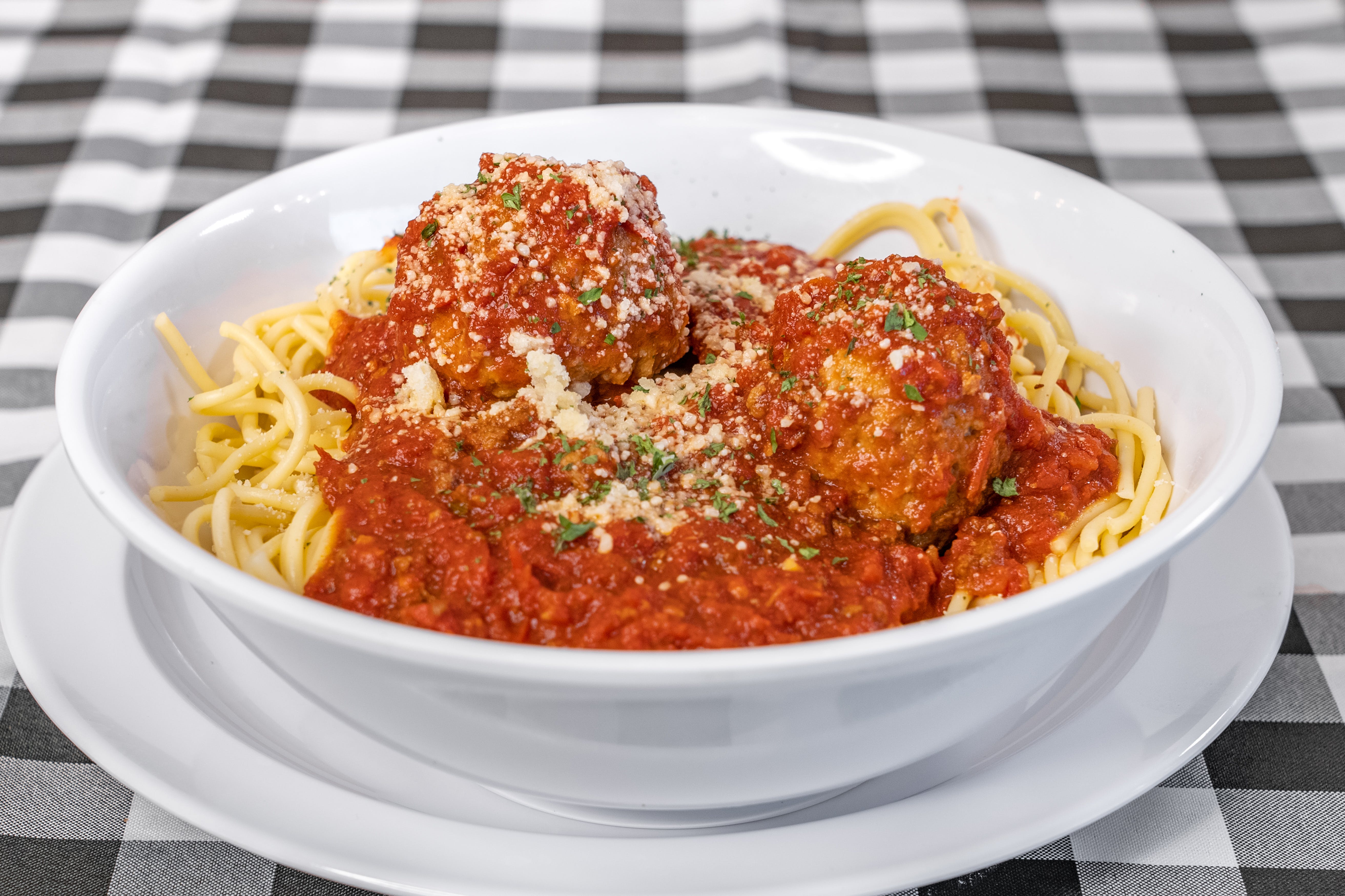 Order Spaghetti with Meatballs - Pasta food online from Bella's Pizzeria store, Moore on bringmethat.com