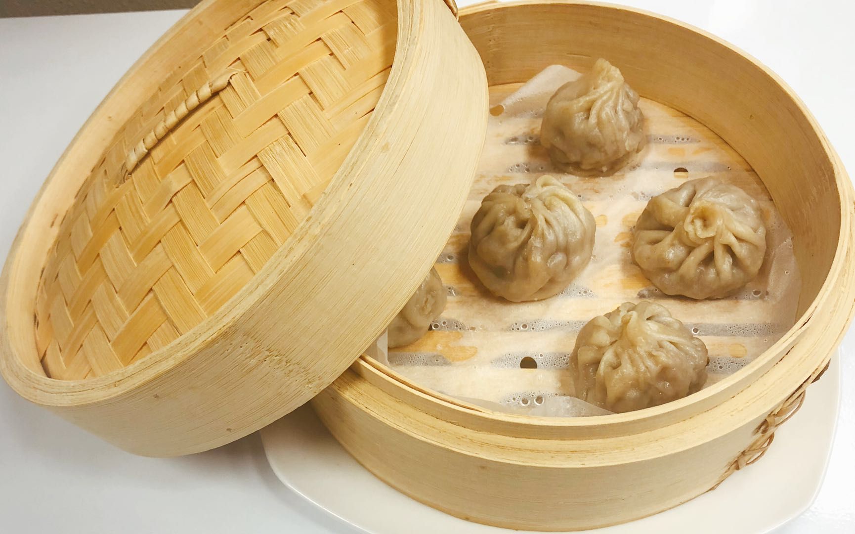 Order D6. Shanghai Dumplings food online from Unit Su Vege store, Philadelphia on bringmethat.com