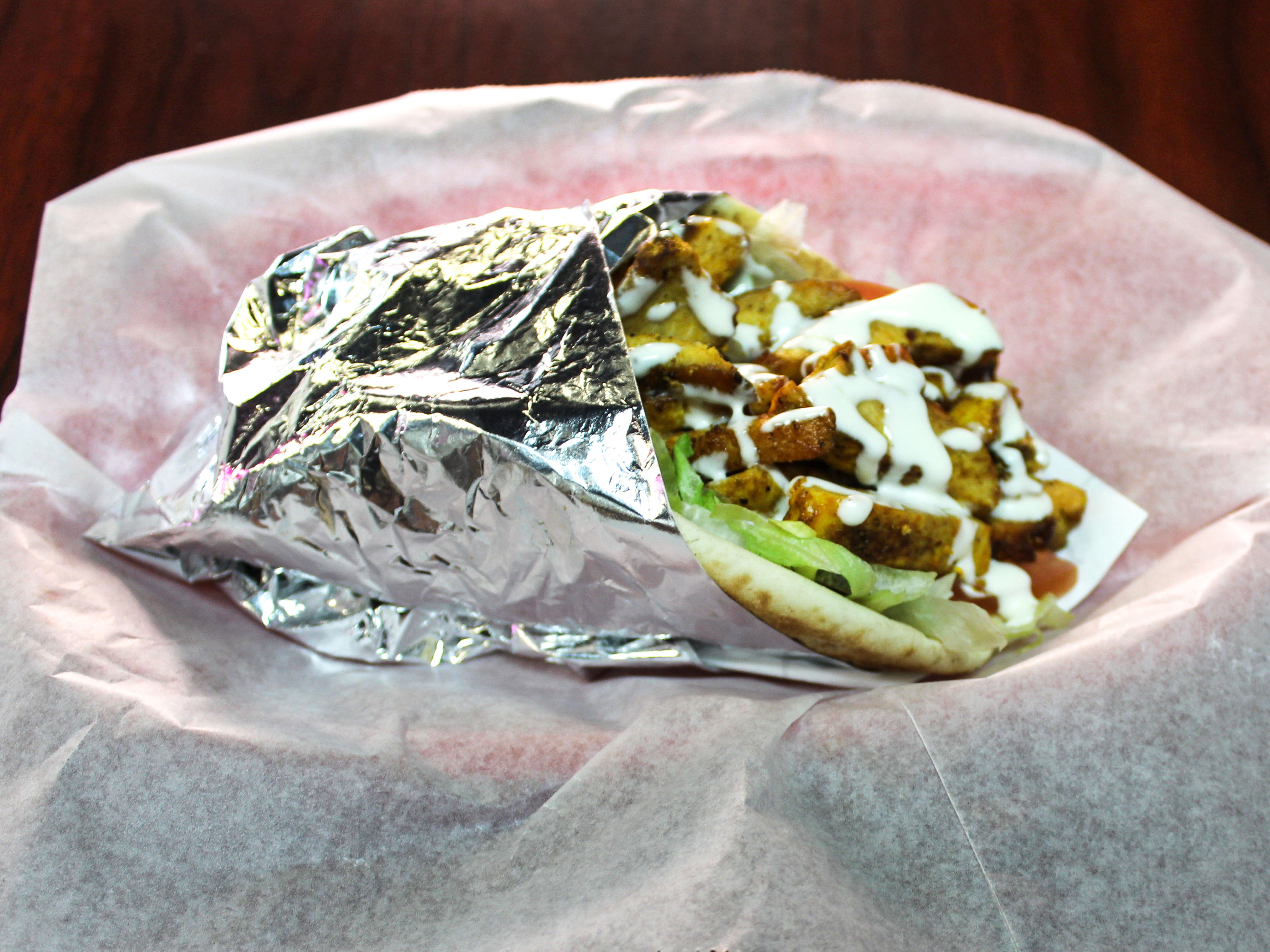 Order Chicken Shawarma Pita food online from Munchies Cafe store, Tempe on bringmethat.com